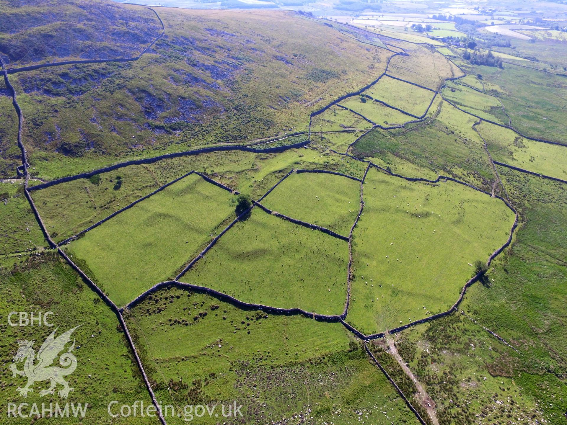 Aerial view of the the relict field system at Tyddyn-Mawr, near Llanaelhaearn, on the Llyn peninsula. Colour photograph taken by Paul R. Davis on 24th June 2018.