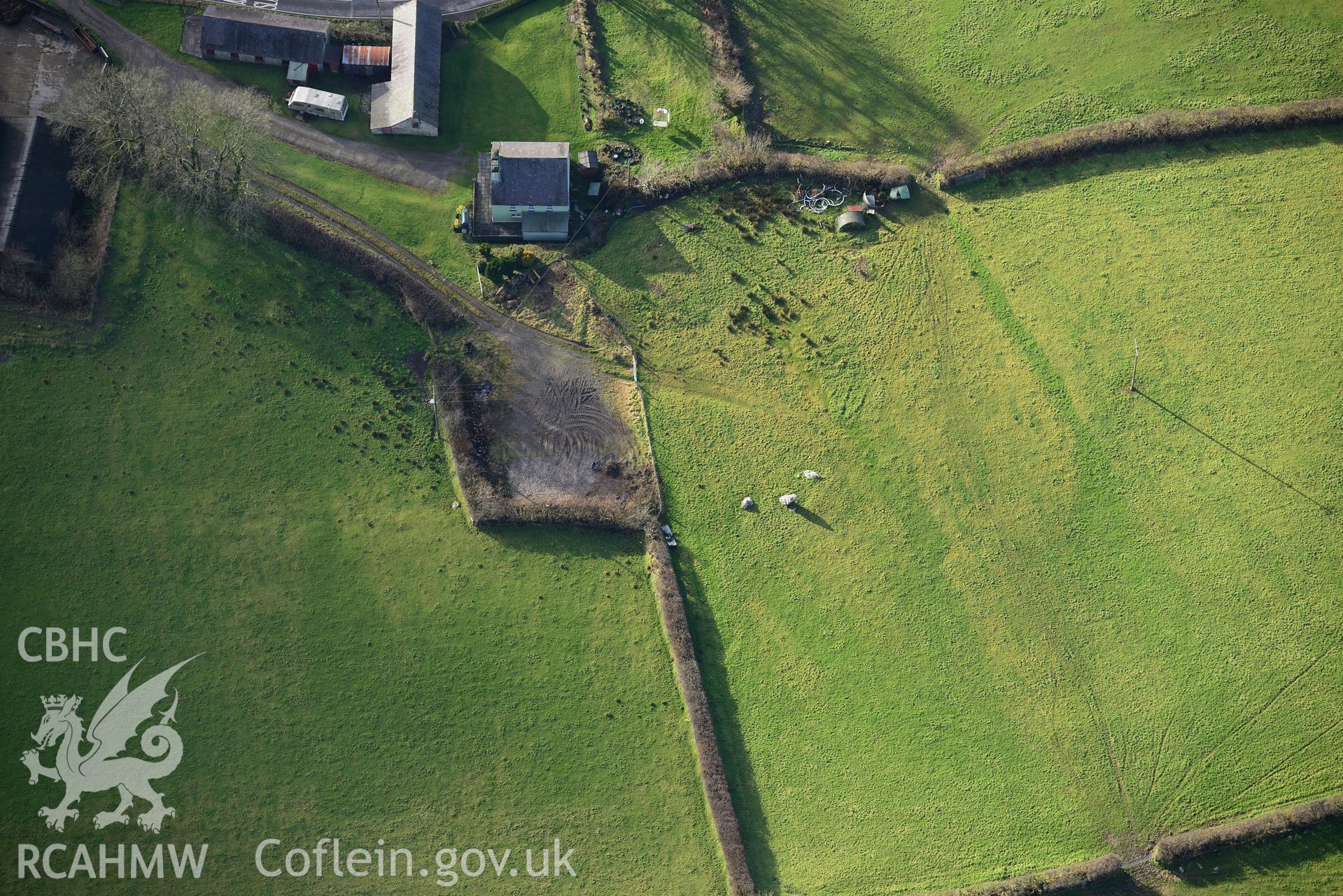 Llech Ciste, Llanegwad. Oblique aerial photograph taken during the Royal Commission's programme of archaeological aerial reconnaissance by Toby Driver on 6th January 2015.