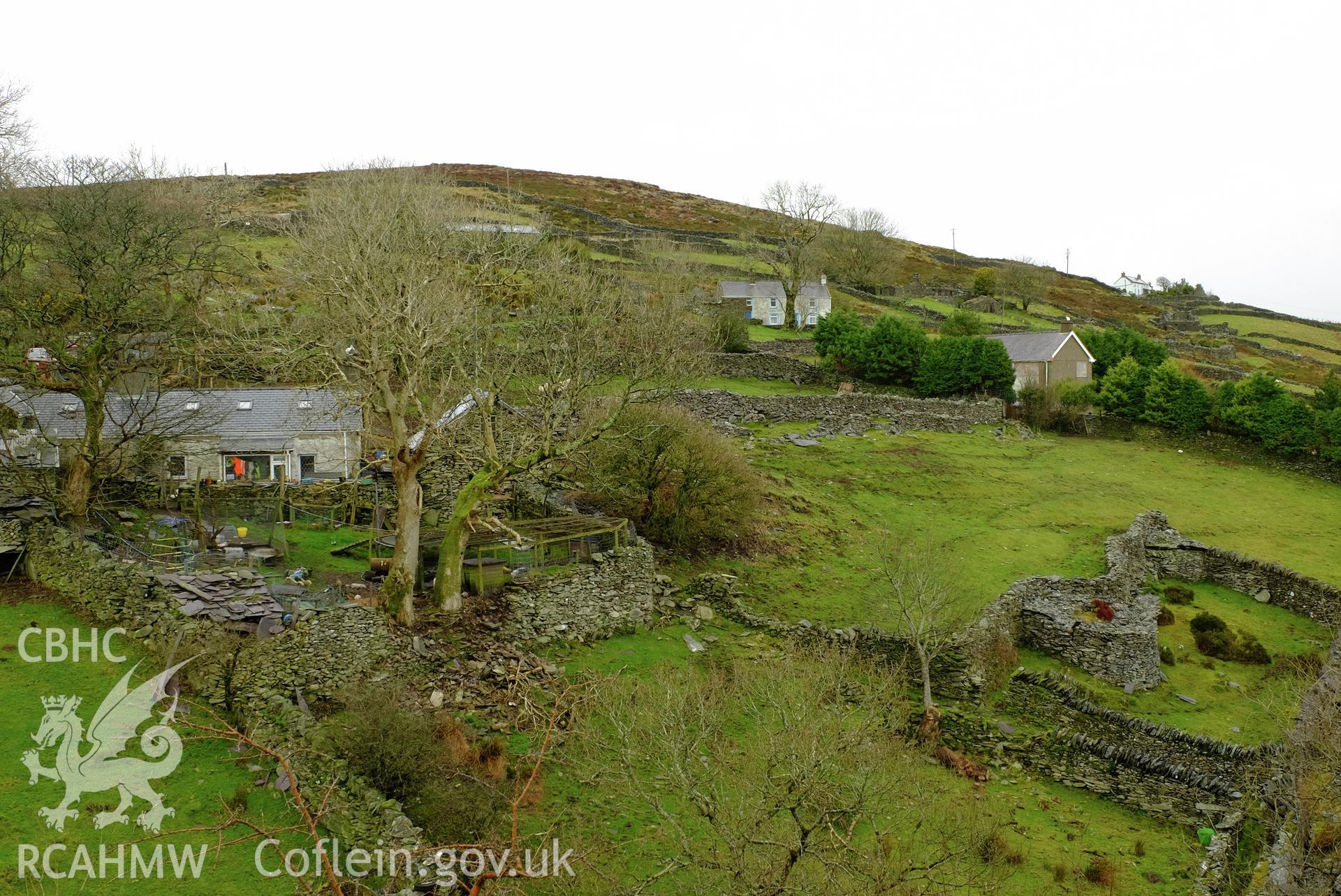 Colour photograph showing view looking north east at field walls and cottages (with Bryn Tirion kennels on the left) in Cilgwyn, produced by Richard Hayman 21st February 2017