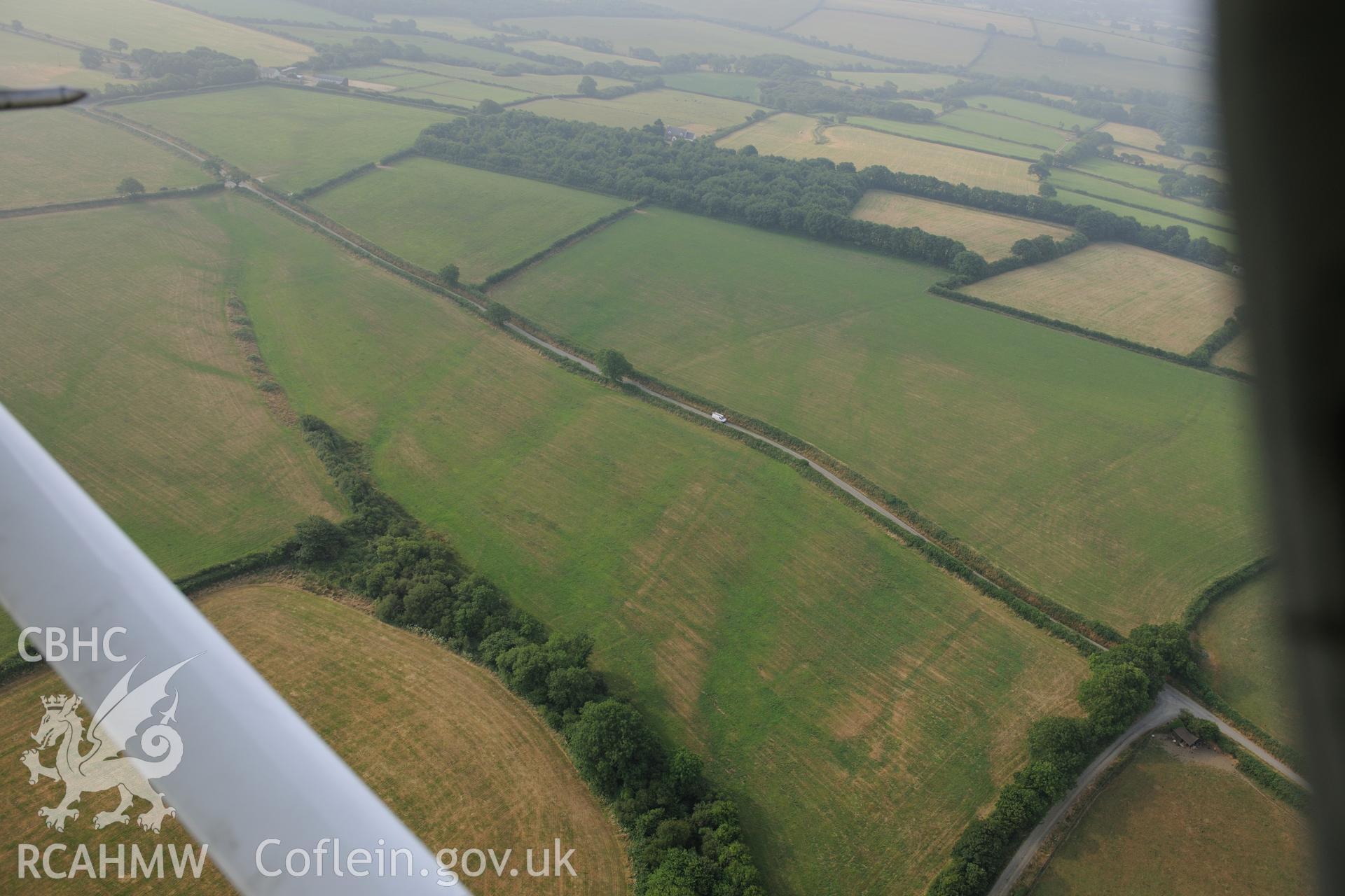 Royal Commission aerial photography of the possible Roman road line near West Dairy recorded during drought conditions on 22nd July 2013.