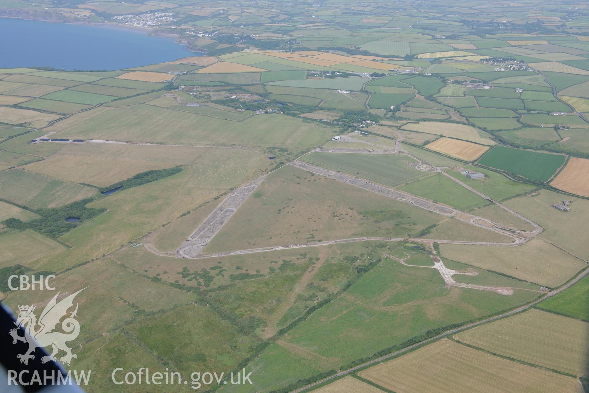 Talbenny Airfield. Oblique aerial photograph taken during the Royal Commission?s programme of archaeological aerial reconnaissance by Toby Driver on 16th July 2013.