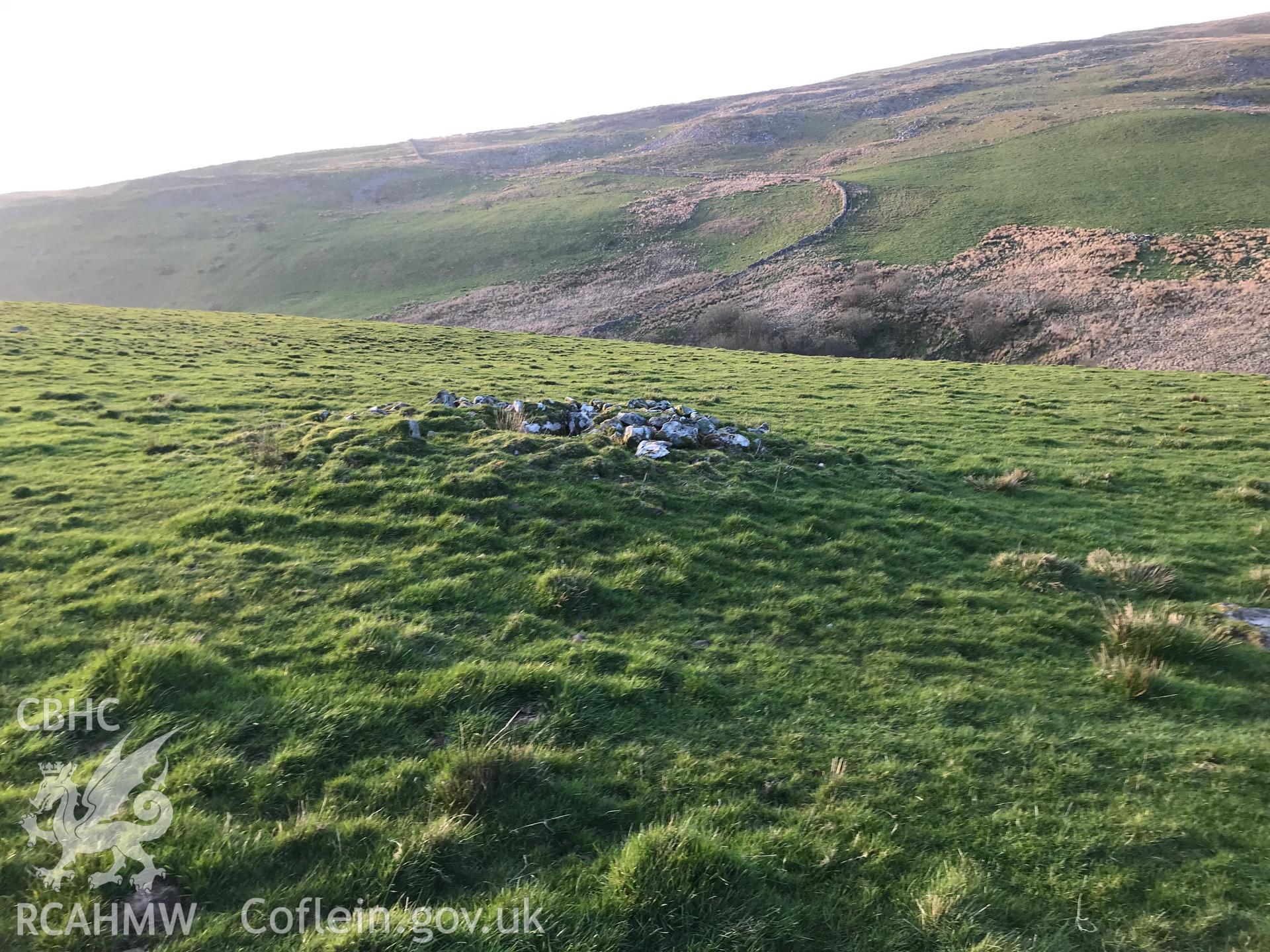 Colour photograph of western cairn at Cae'r Arglwydd on Moel y Garn, north east of Talybont, taken by Paul R. Davis on 26th February 2019.