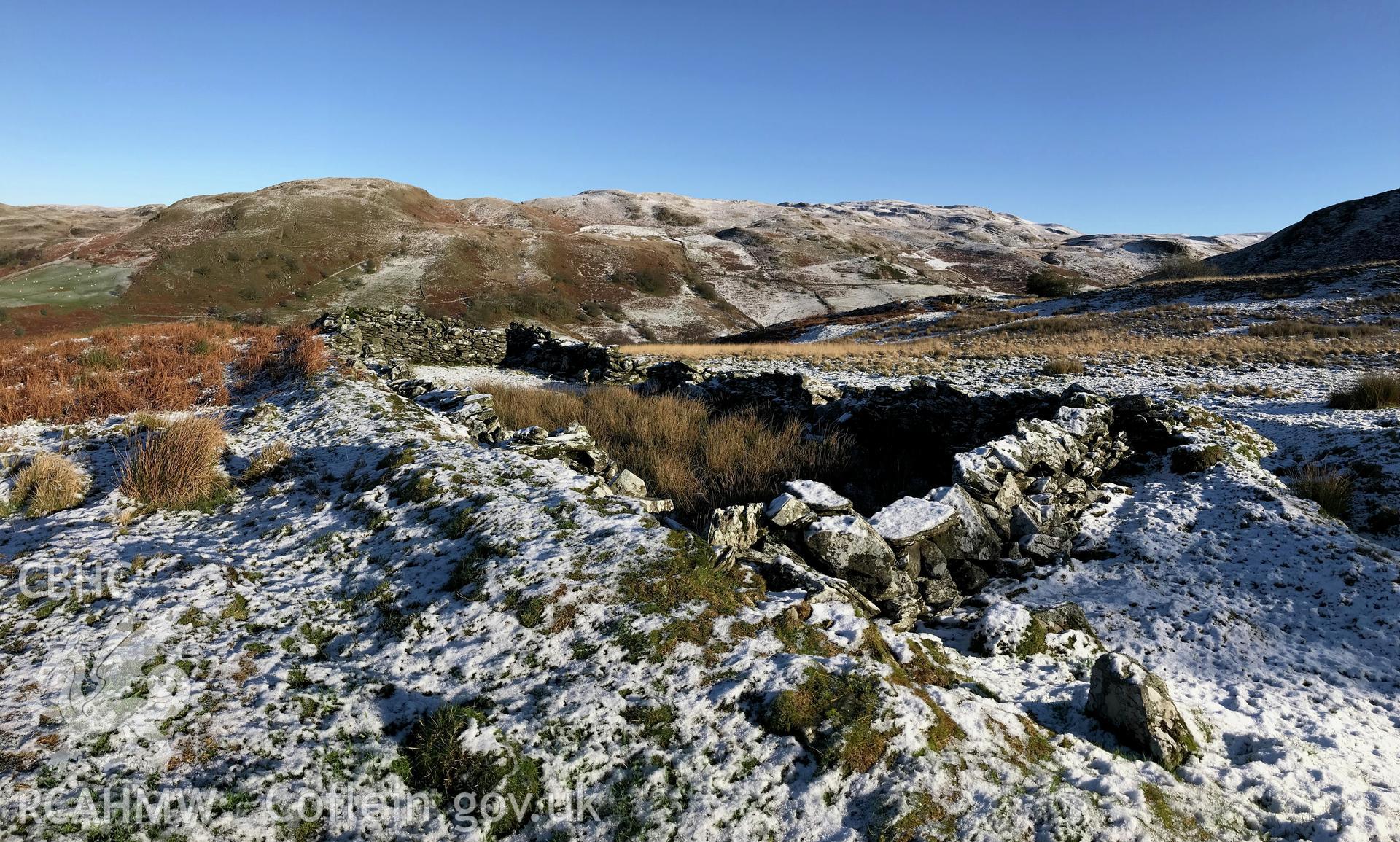 Detailed view showing remains of deserted, dry-stone walled Hafod Eidos rural settlement, Cwm Mwyro. Colour photograph taken by Paul R. Davis on 17th January 2019.