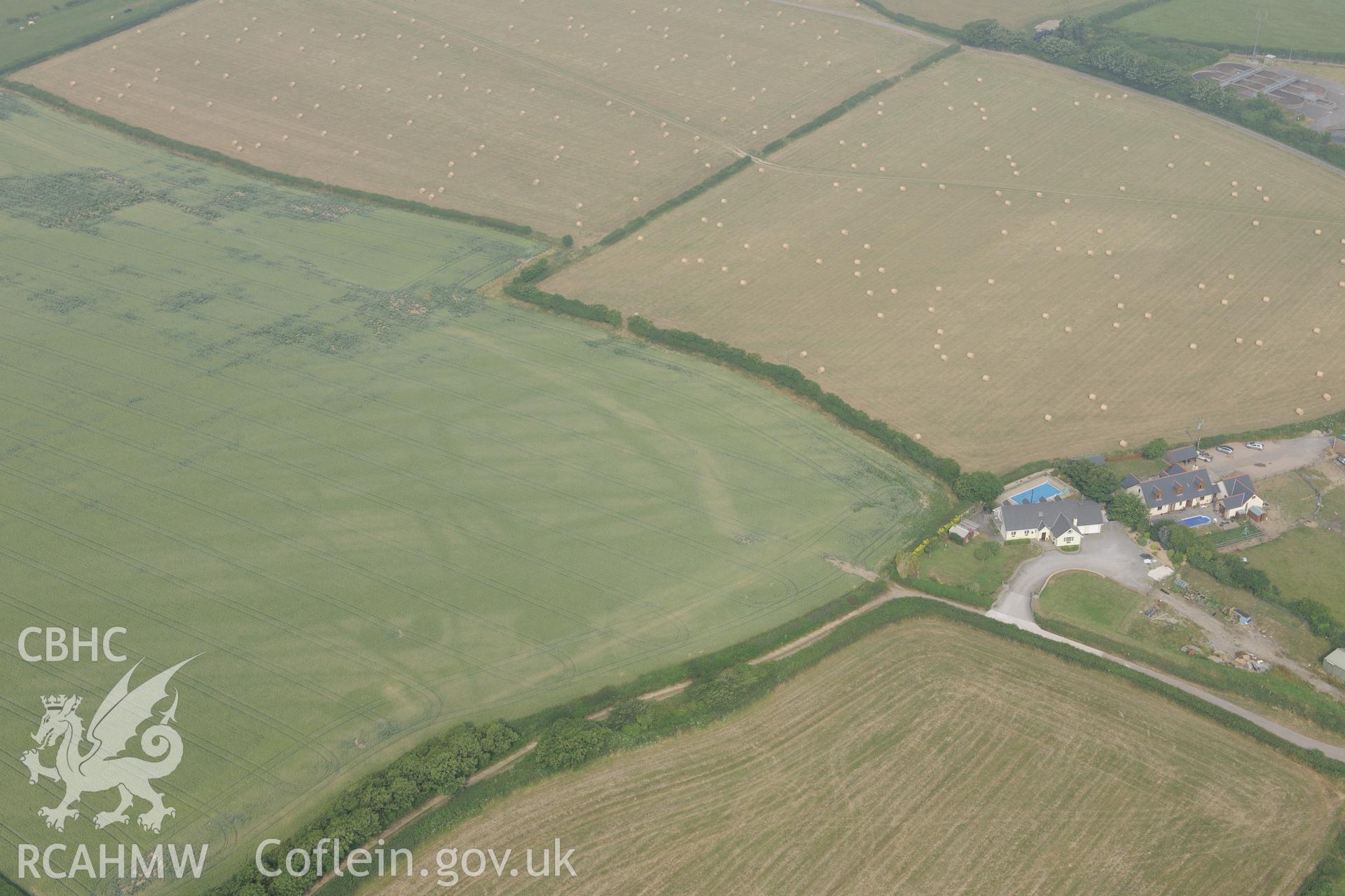 Royal Commission aerial photography of cropmarks at Moorlands Farm recorded during drought conditions on 22nd July 2013 at the time of their discovery.