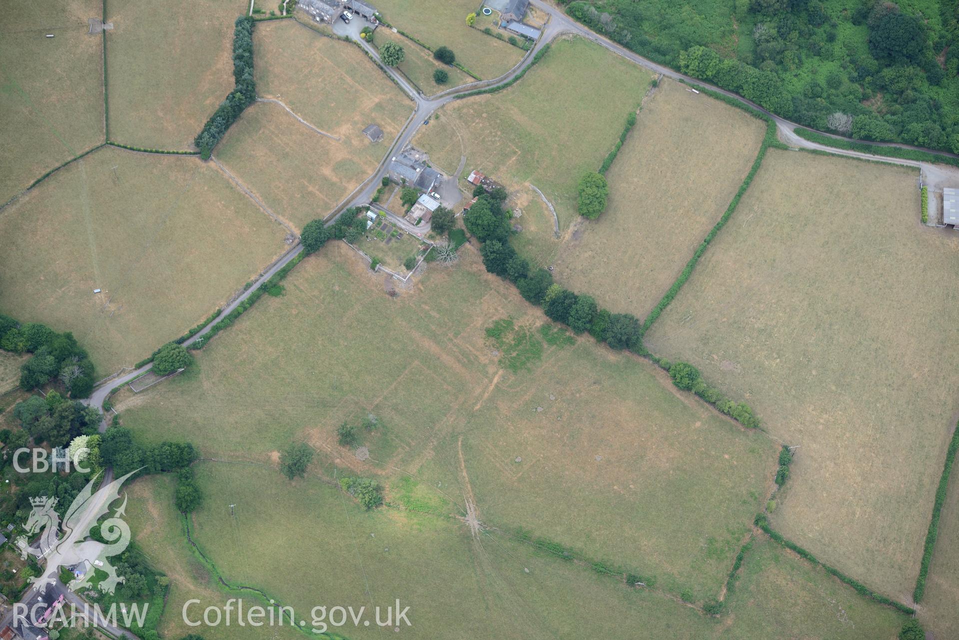 Royal Commission aerial photography of extensive parchmarks at Pen y Gaer Roman fort, including the internal plan and extramural buildings, taken on 19th July 2018 during the 2018 drought.