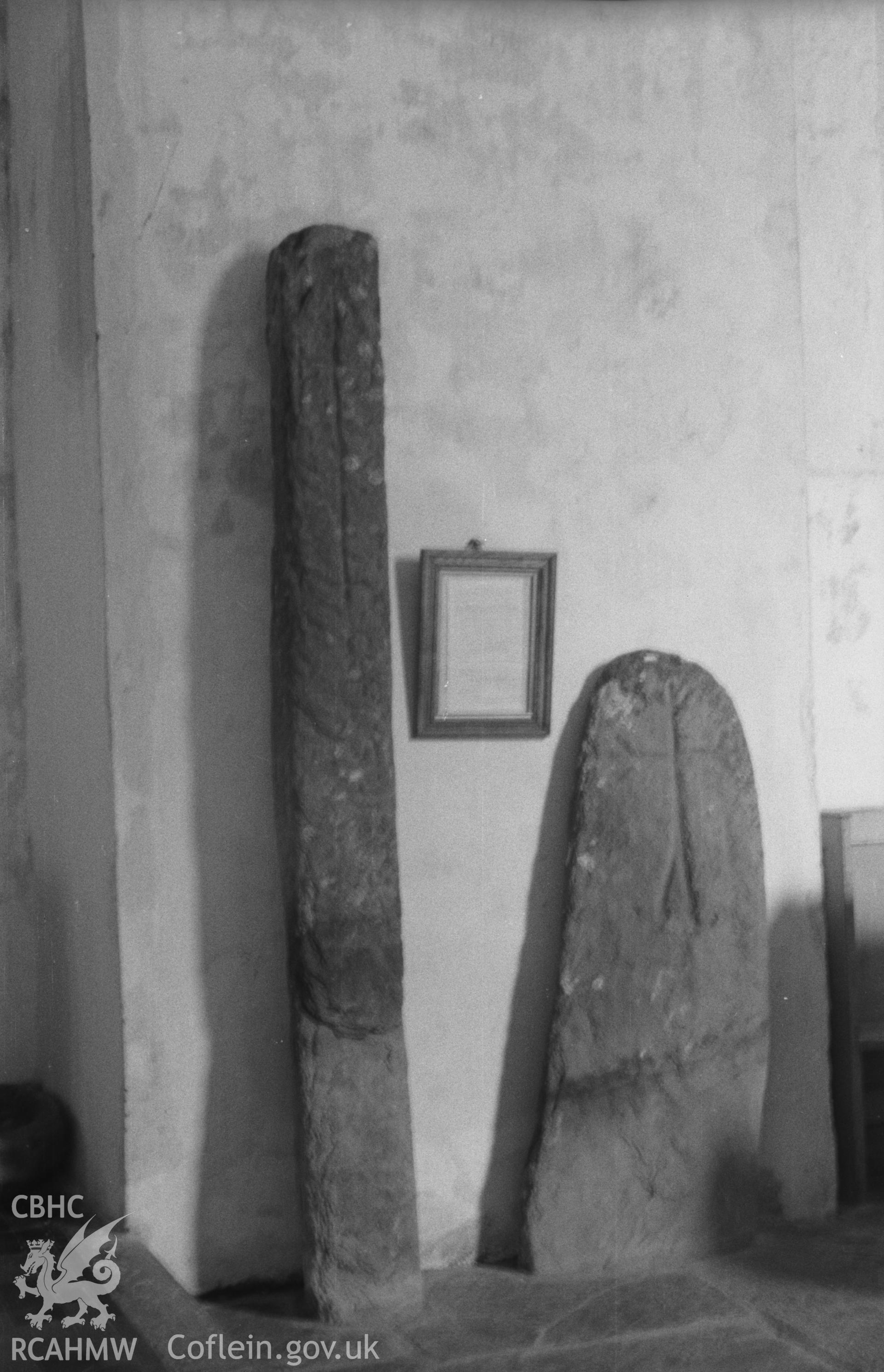 Digital copy of a black and white negative showing sculptured stones at St. David's Church, Llanddewi Brefi. Photographed in April 1963 by Arthur O. Chater.