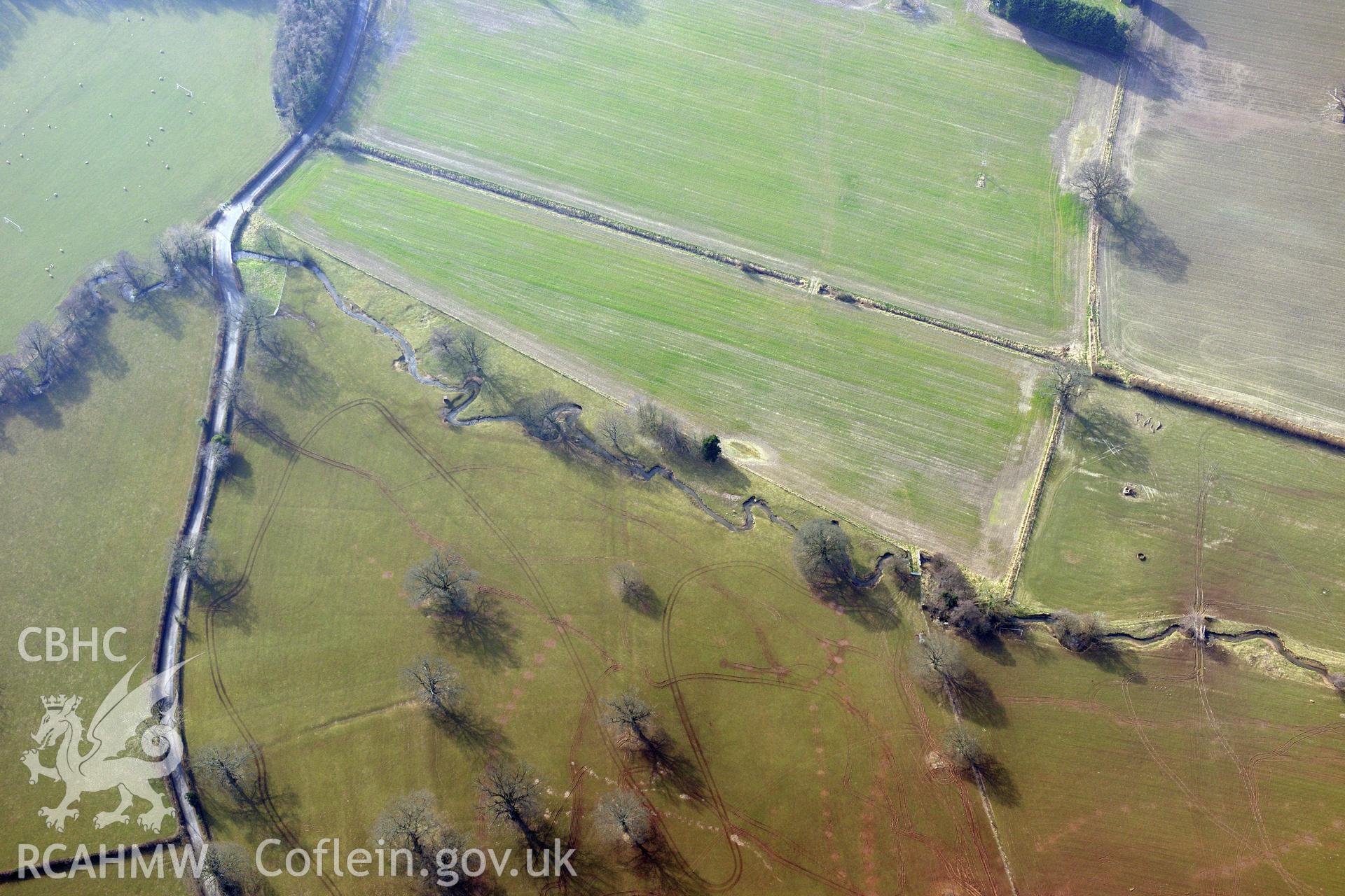 Plas Newydd Romano-British temple cropmark, Llanfair Dyffryn Clwyd, south east of Ruthin. Oblique aerial photograph taken during the Royal Commission?s programme of archaeological aerial reconnaissance by Toby Driver on 28th February 2013.