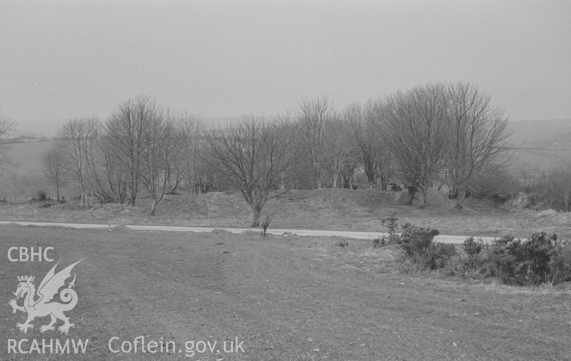 Digital copy of a black and white negative showing exterior view of Gaer Fach Iron Age homestead, Cribyn, Lampeter. Photographed in April 1964 by Arthur O. Chater from Grid Reference SN 5322 5146, looking west.