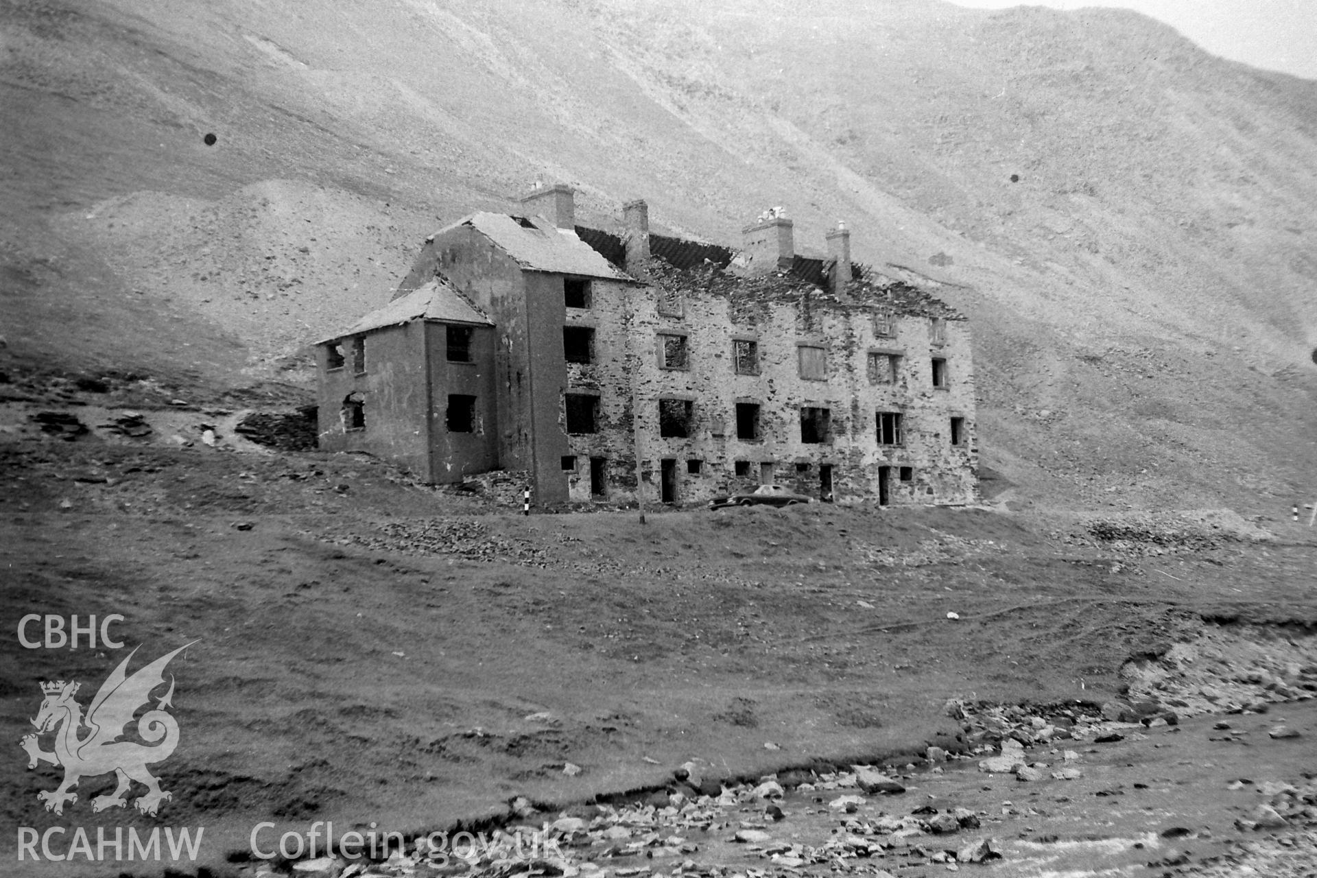 Digitised black and white photograph showing 'barracks at Cwmystwyth.' Photographed by Martin Davies as part of his Bachelor of Architecture dissertation from the University of Nottingham, 1979.