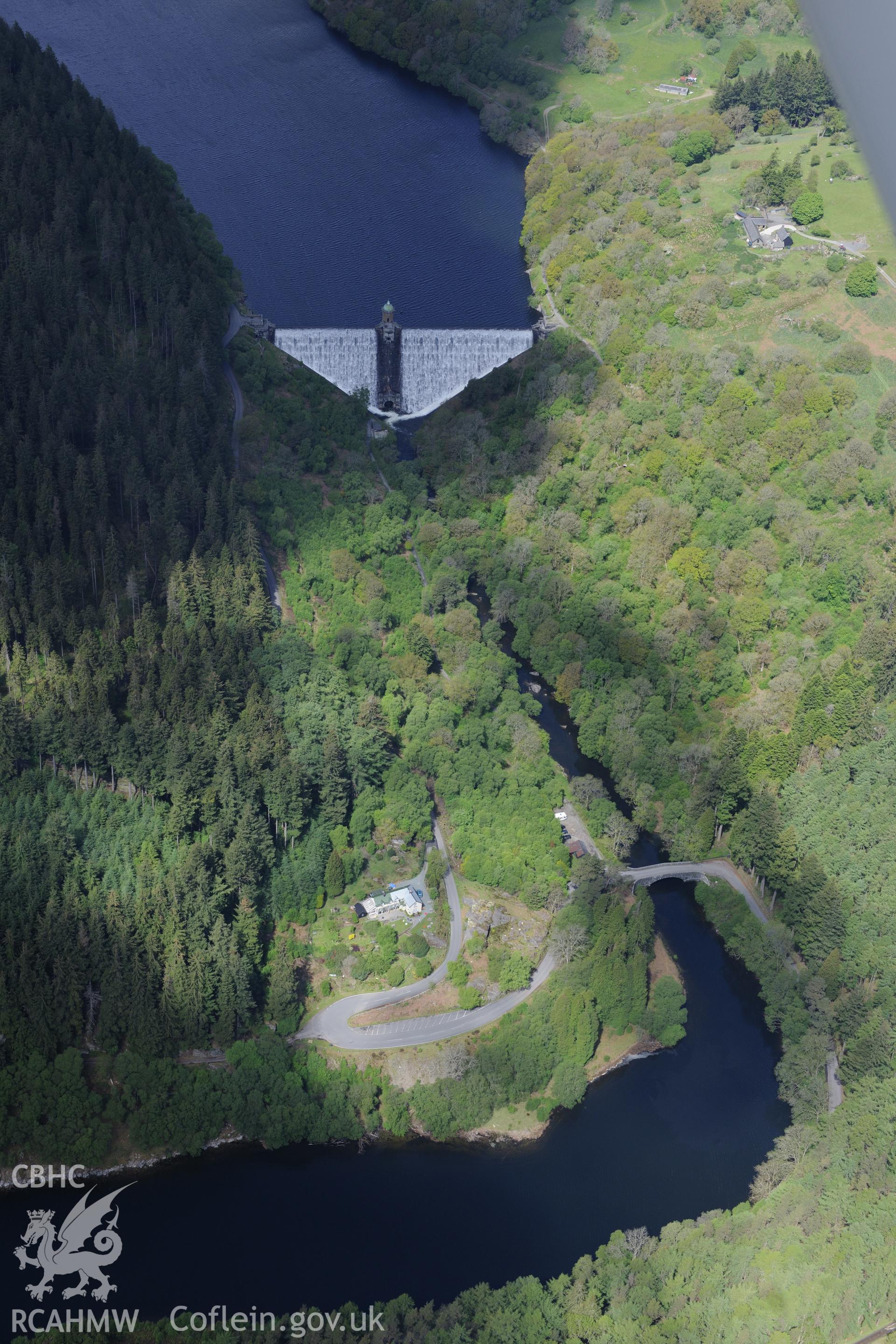 Pen-y-Garreg reservoir, dam and valve tower, pont Myllfan bridge and Pen-y-Bont house. Oblique aerial photograph taken during the Royal Commission's programme of archaeological aerial reconnaissance by Toby Driver on 3rd June 2015.