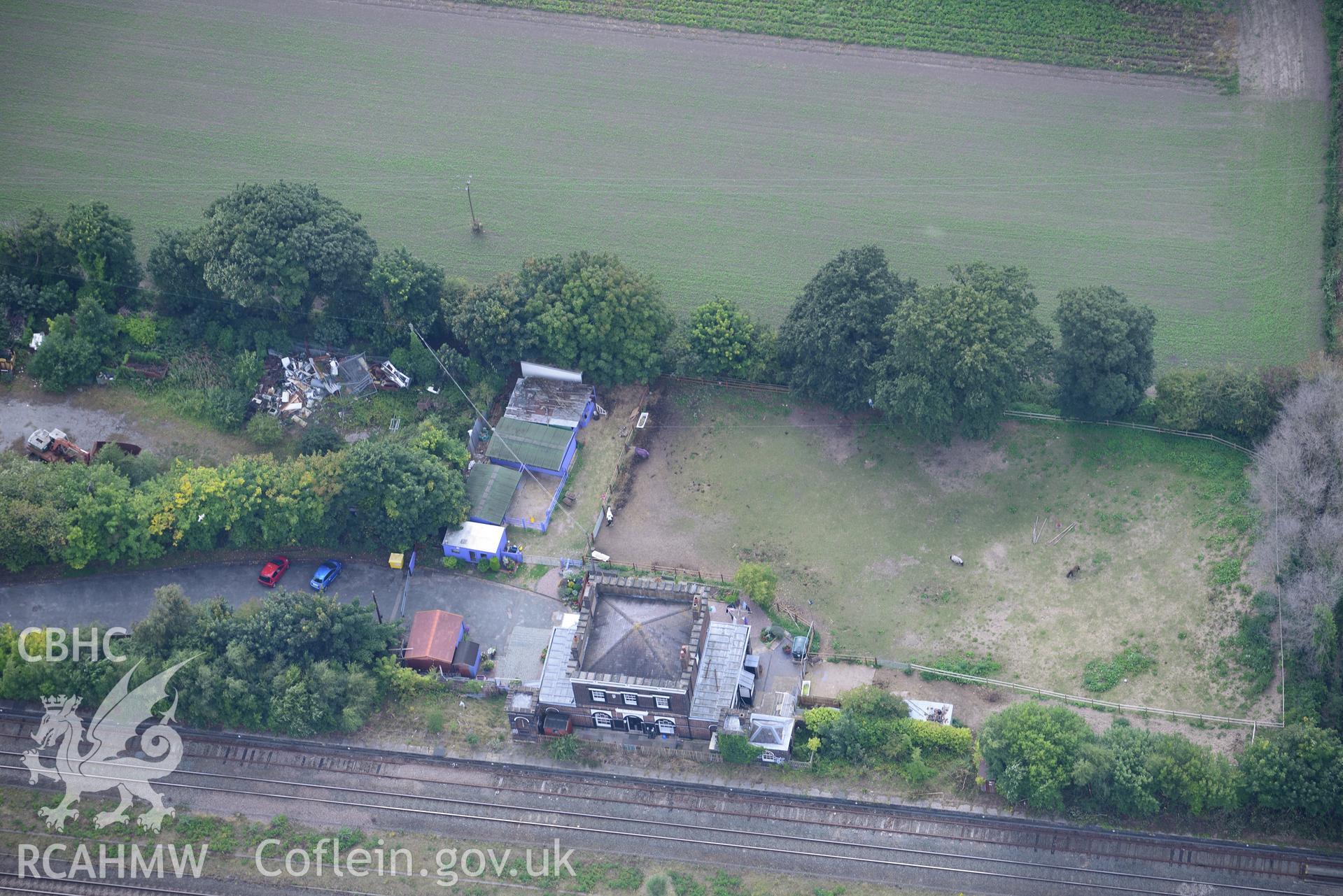 Holywell Junction railway station. Oblique aerial photograph taken during the Royal Commission's programme of archaeological aerial reconnaissance by Toby Driver on 11th September 2015.