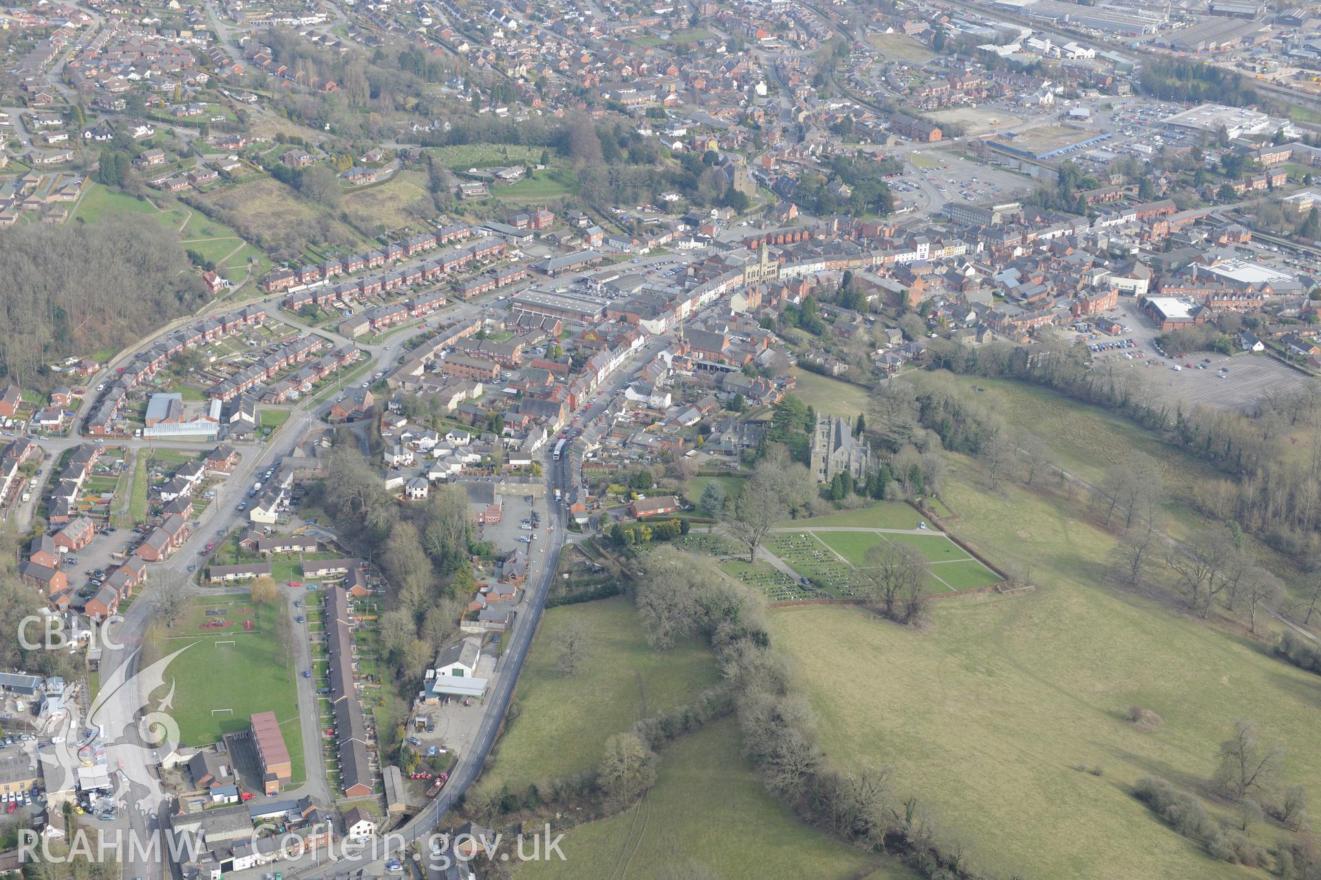 Christ church, surrounded by the town of Welshpool. Oblique aerial photograph taken during the Royal Commission?s programme of archaeological aerial reconnaissance by Toby Driver on 28th February 2013.