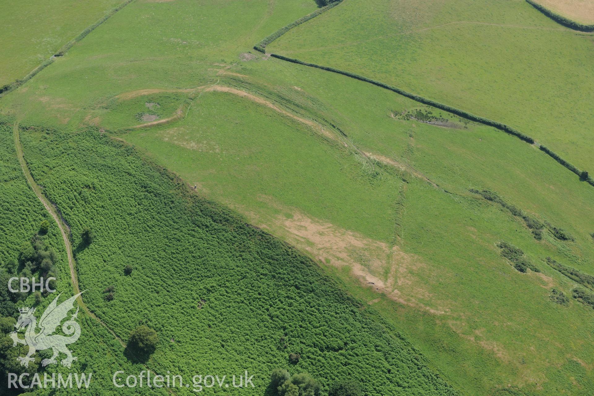 Cil Ifor Top Promontory Fort near Llanrhidian, on the Gower. Oblique aerial photograph taken during the Royal Commission?s programme of archaeological aerial reconnaissance by Toby Driver on 16th July 2013.