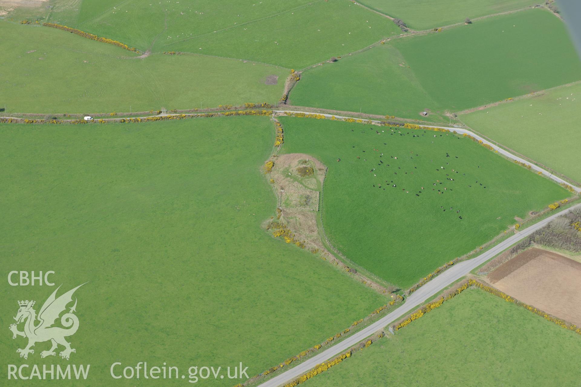 Crugiau Cemmaes Barrow I and II. Oblique aerial photograph taken during the Royal Commission's programme of archaeological aerial reconnaissance by Toby Driver on 15th April 2015.