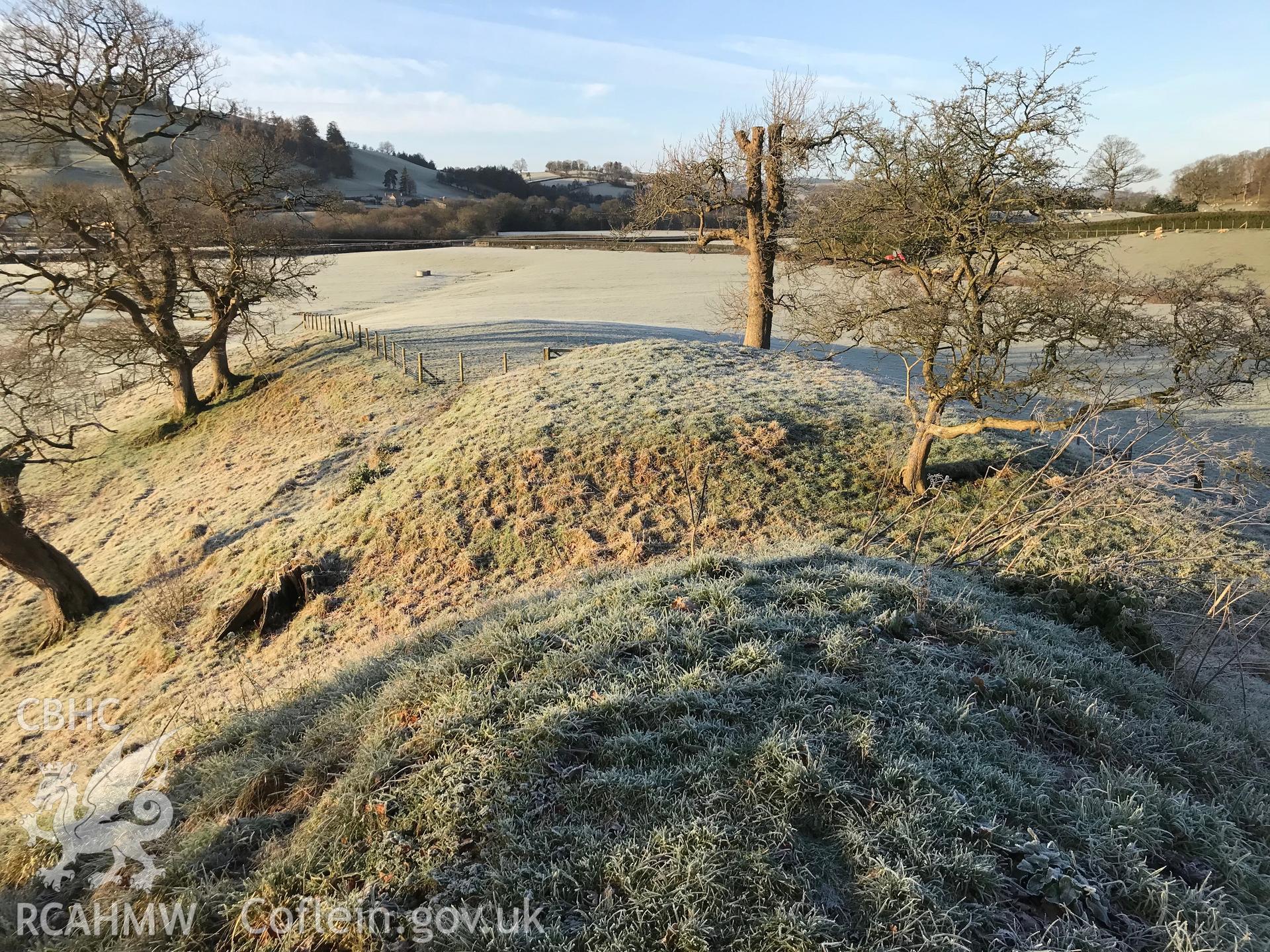 View of Llysun motte and bailey castle, Llanerfyl. Colour photograph taken by Paul R. Davis on 2nd January 2019.