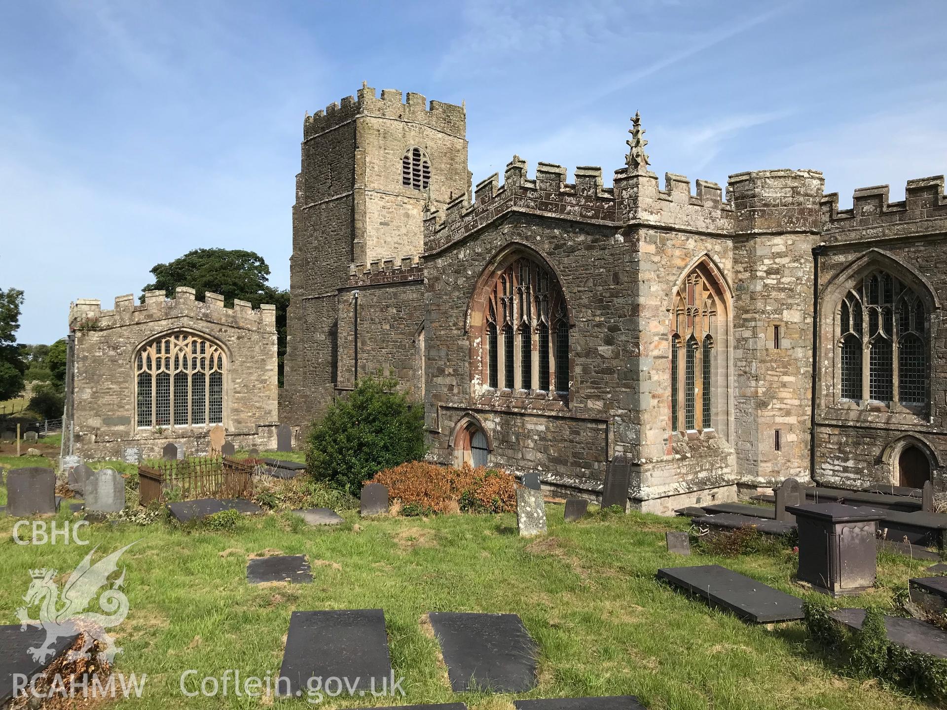 Colour photo showing external view of St. Bueno's Church and associated graveyard, Clynnog Fawr, taken by Paul R. Davis, 23rd June 2018.