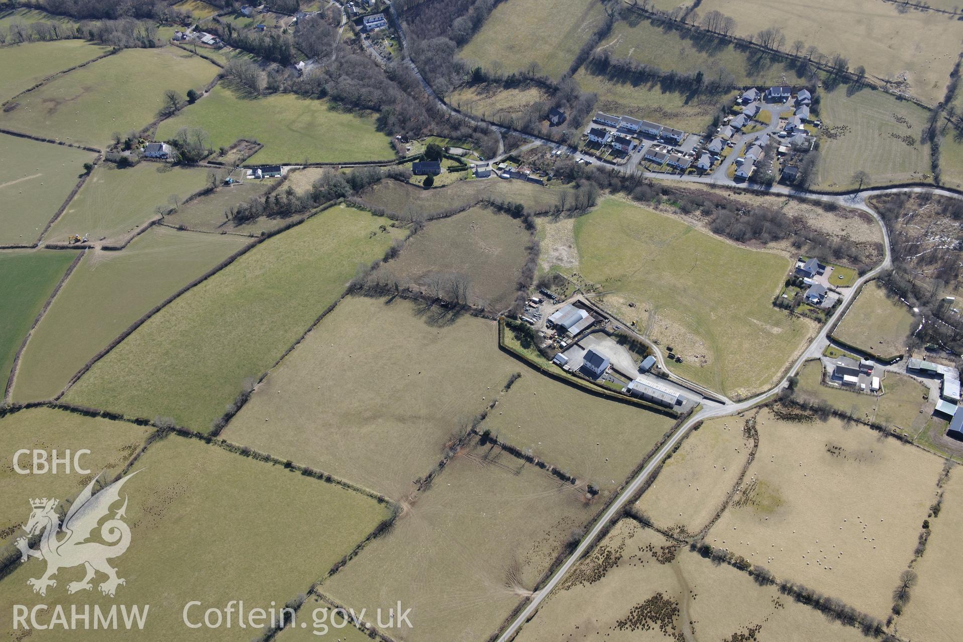 St Sulien's church, in the village of Silian, north of Lampeter. Oblique aerial photograph taken during the Royal Commission?s programme of archaeological aerial reconnaissance by Toby Driver on 2nd April 2015.