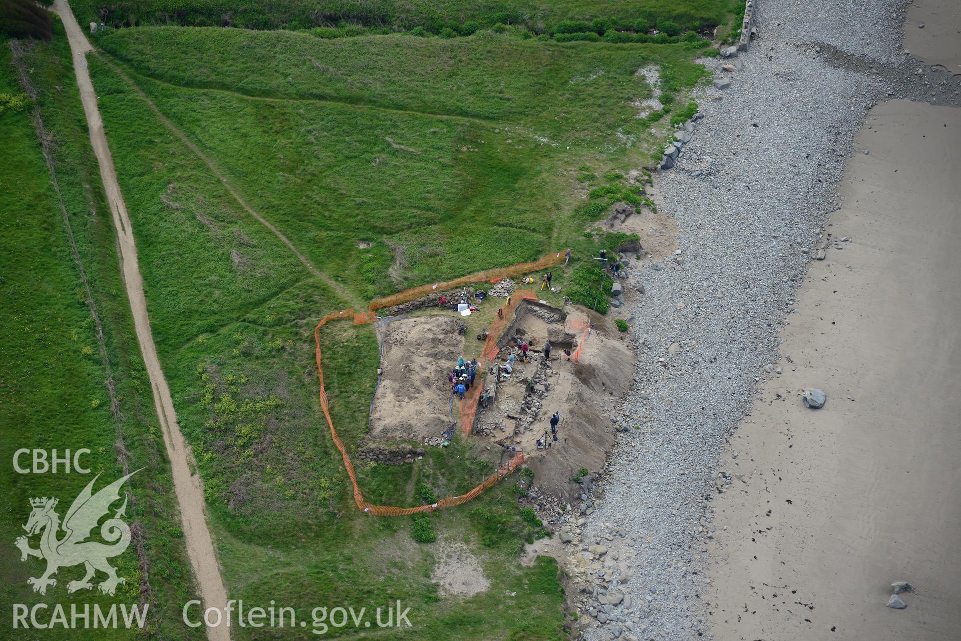 Dyfed Archaeological Trust excavating site of St. Patrick's chapel at Whitesands Bay. Oblique aerial photograph taken during the Royal Commission's programme of archaeological aerial reconnaissance by Toby Driver on 13th May 2015.