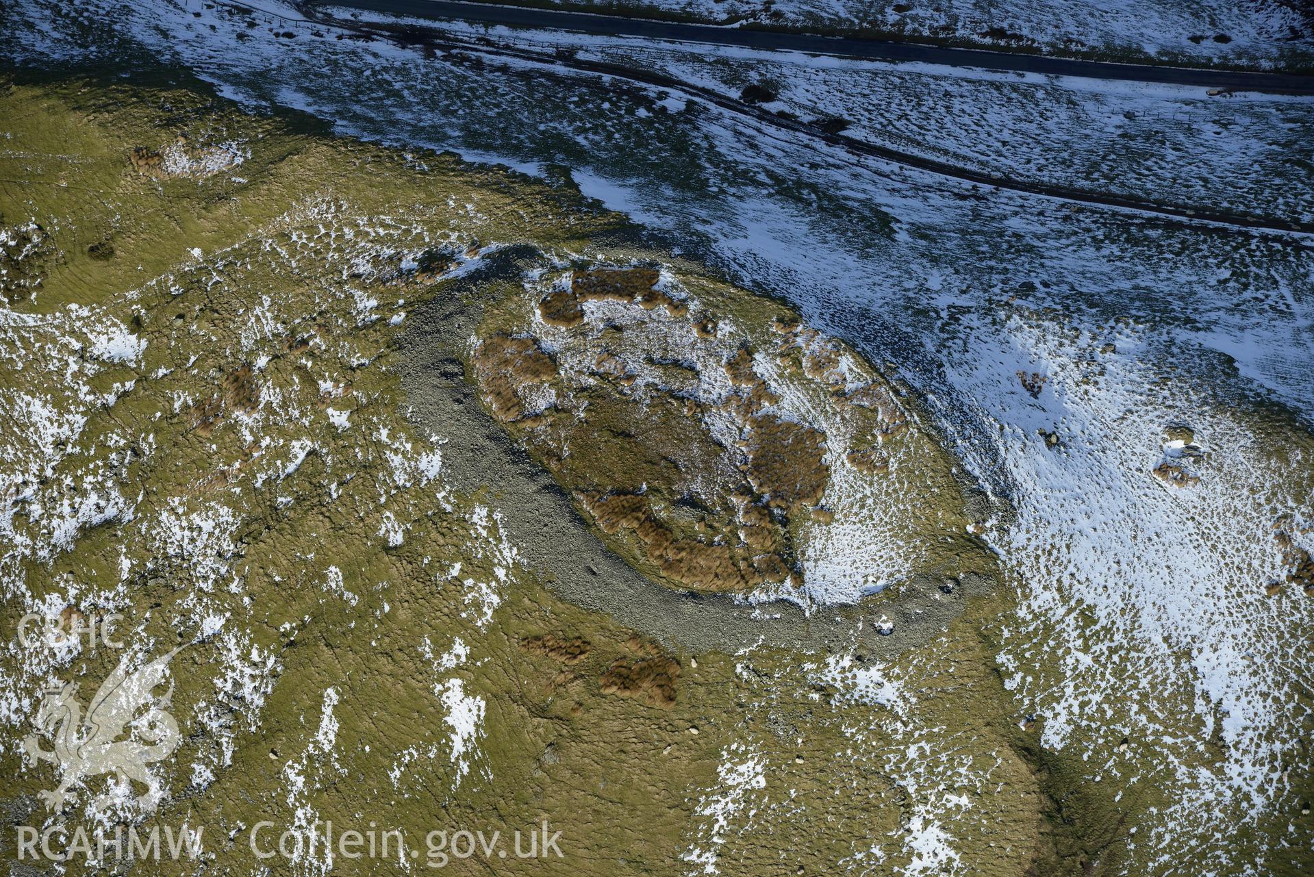 Pen-y-Gaer hillfort, Llanidloes. Oblique aerial photograph taken during the Royal Commission's programme of archaeological aerial reconnaissance by Toby Driver on 4th February 2015.