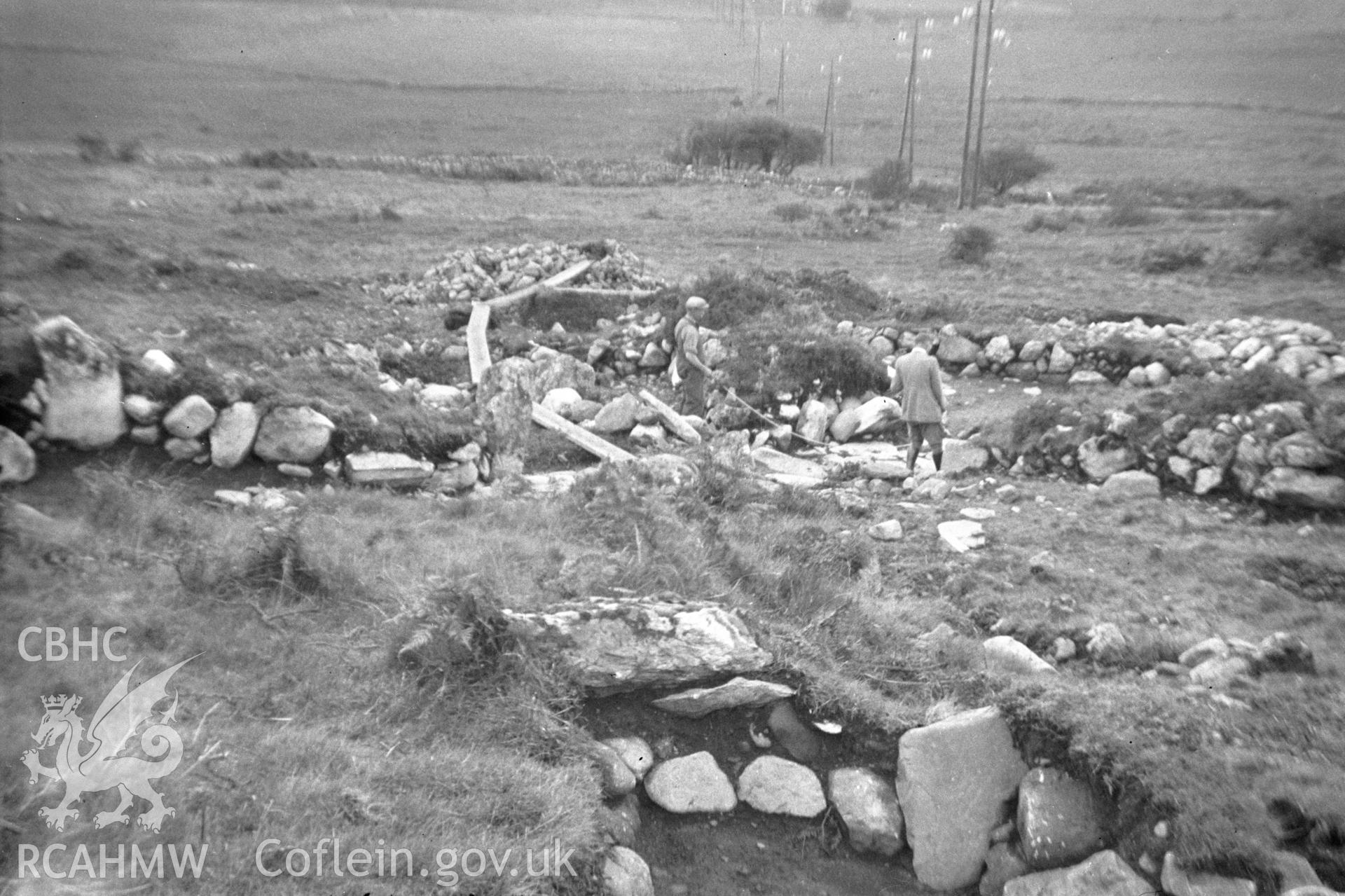 Digital copy of a nitrate negative showing Caerau ancient village. From the Cadw Monuments in Care Collection.