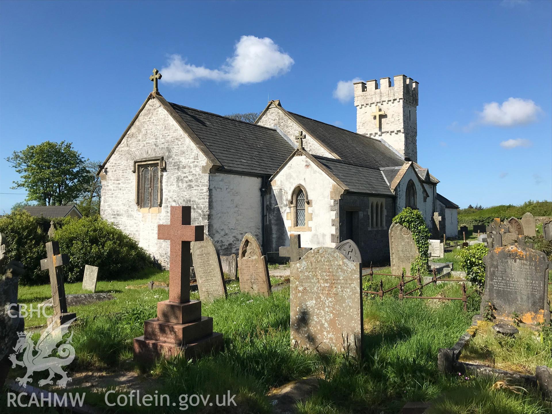 Colour photo showing exterior view of St. Mary's church and graveyard, Pennard, taken by Paul R. Davis, 13th May 2018.