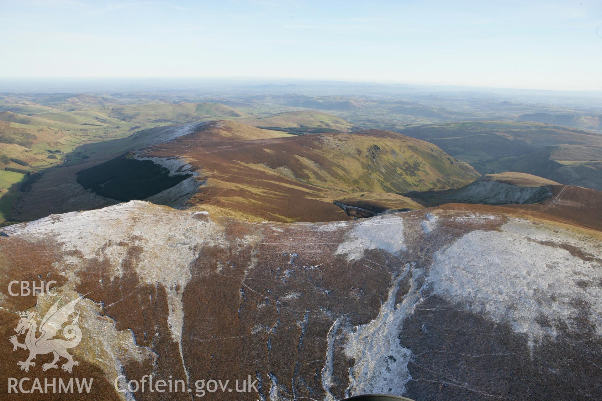 RCAHMW colour oblique photograph of Moel Sych and Moel yr Ewig summits, from the south-west. Taken by Toby Driver on 08/02/2011.