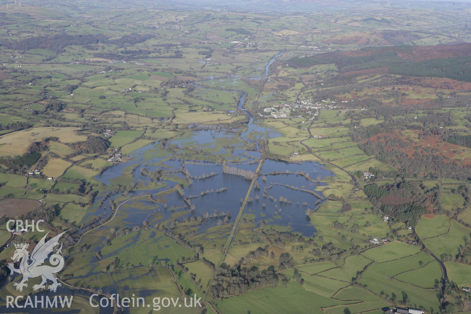 RCAHMW colour oblique photograph of Afon Dyfrdwy in flood, to the north of Llandrillo. Taken by Toby Driver on 08/02/2011.