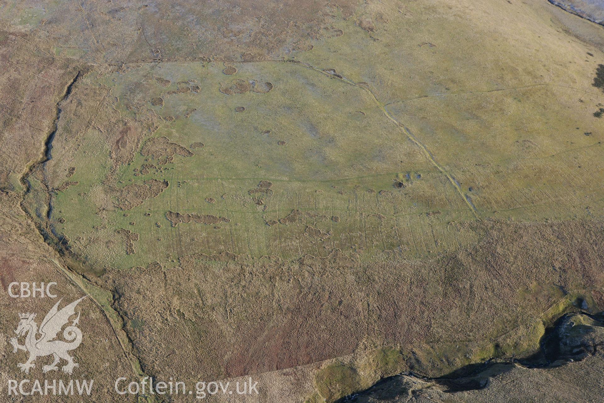 RCAHMW colour oblique photograph of Cwm Tywyll House Platforms. Taken by Toby Driver on 08/02/2011.