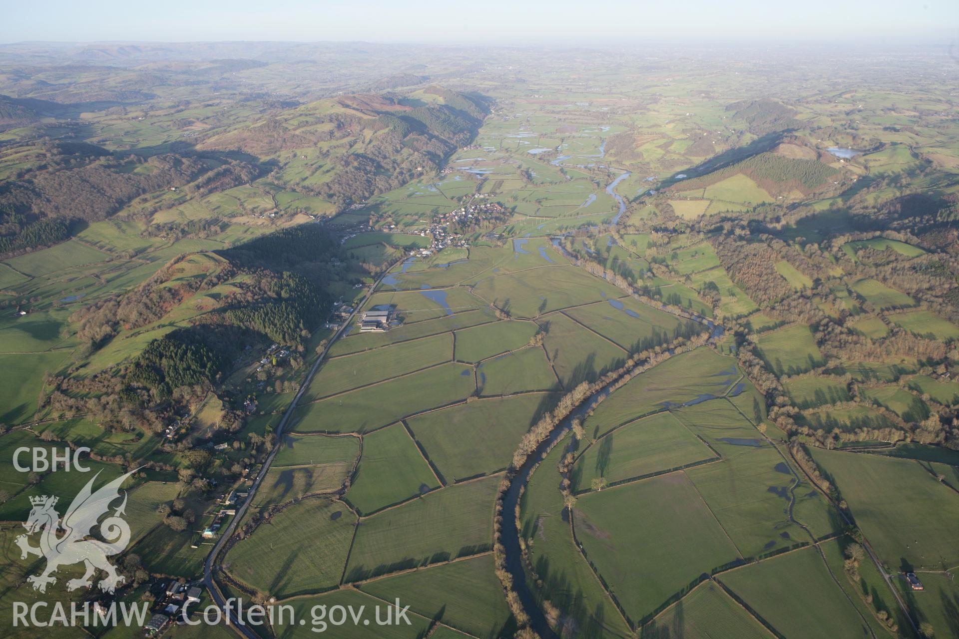 RCAHMW colour oblique photograph of Dyffryn Meifod with Meifod village. Taken by Toby Driver on 08/02/2011.