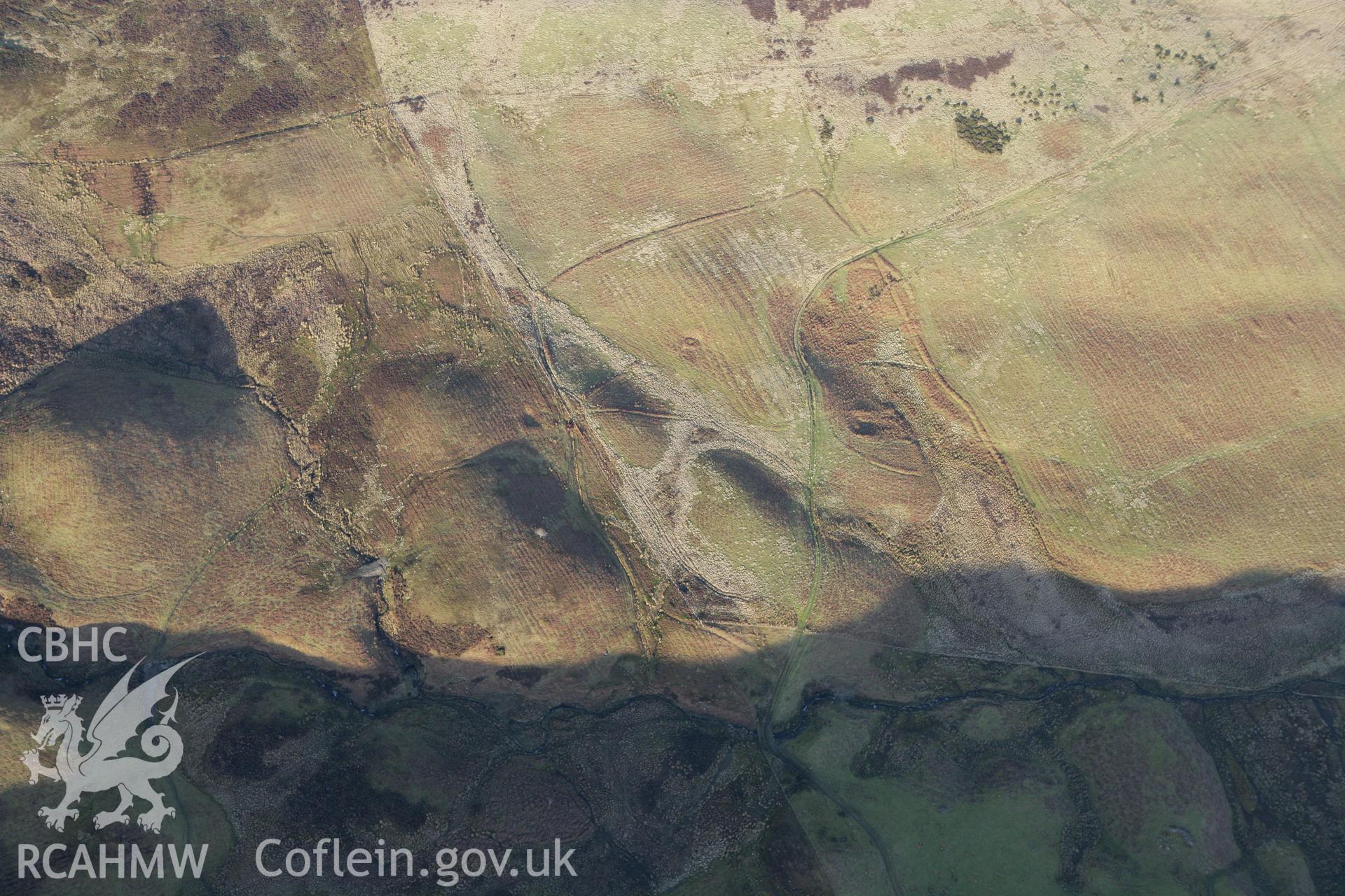 RCAHMW colour oblique photograph of Llanwyddyn Hospitium site. Taken by Toby Driver on 08/02/2011.