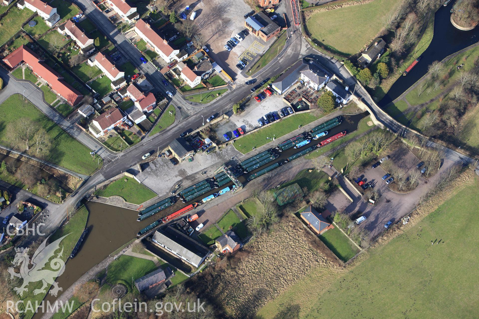 RCAHMW colour oblique photograph of Trevor Wharf and Basin, Llangollen canal. Taken by Toby Driver on 08/02/2011.