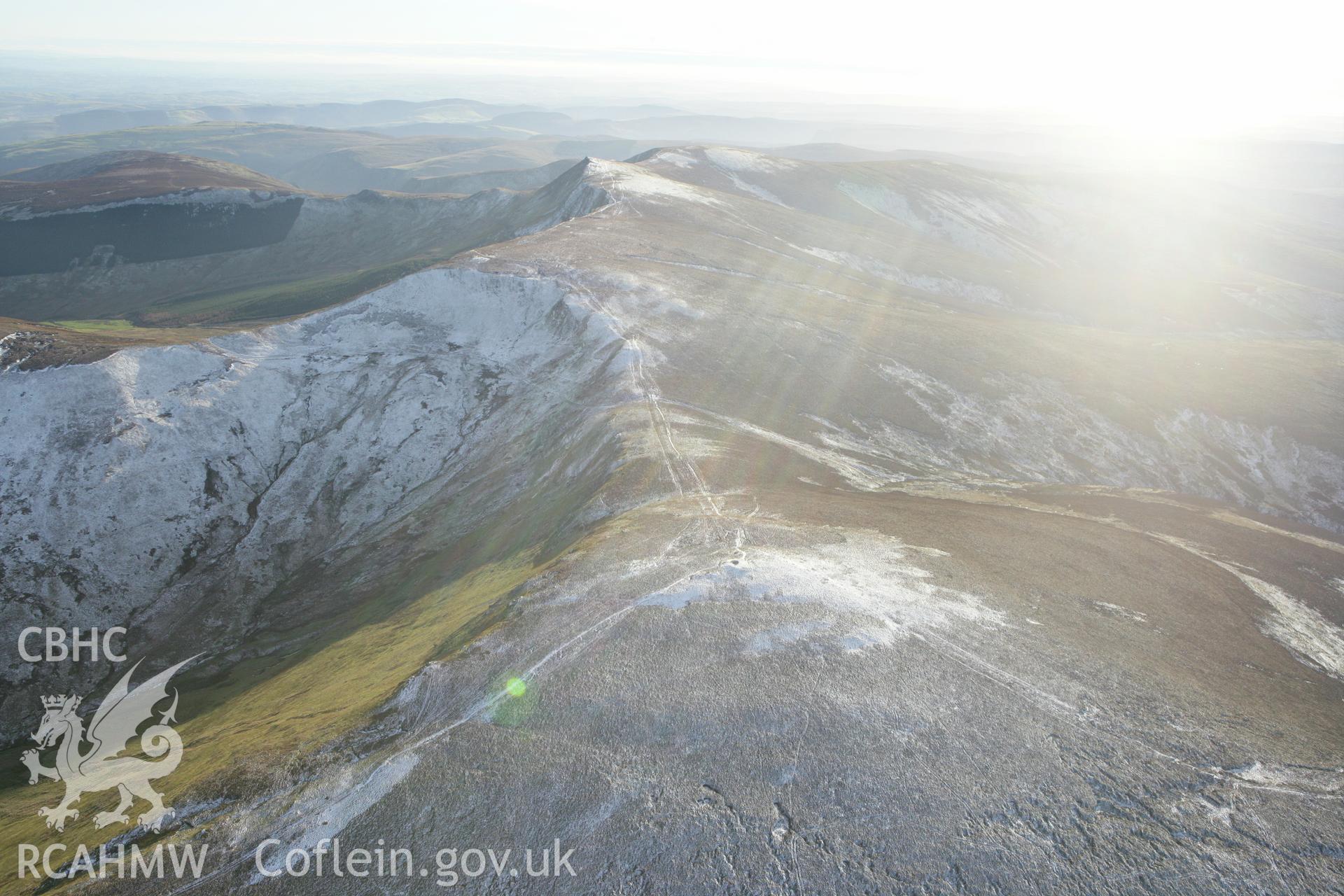 RCAHMW colour oblique photograph of Moel Sych cairn. Taken by Toby Driver on 08/02/2011.