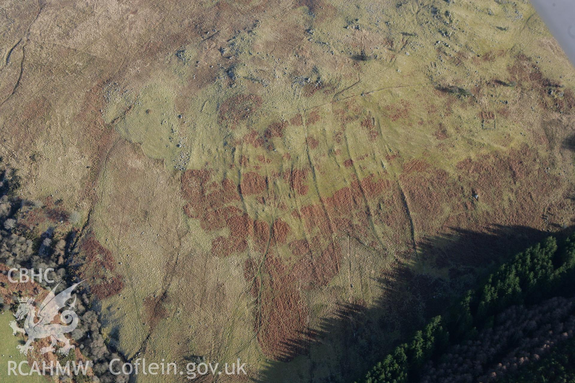 RCAHMW colour oblique photograph of Cwm Tywyll House Platforms. Taken by Toby Driver on 08/02/2011.