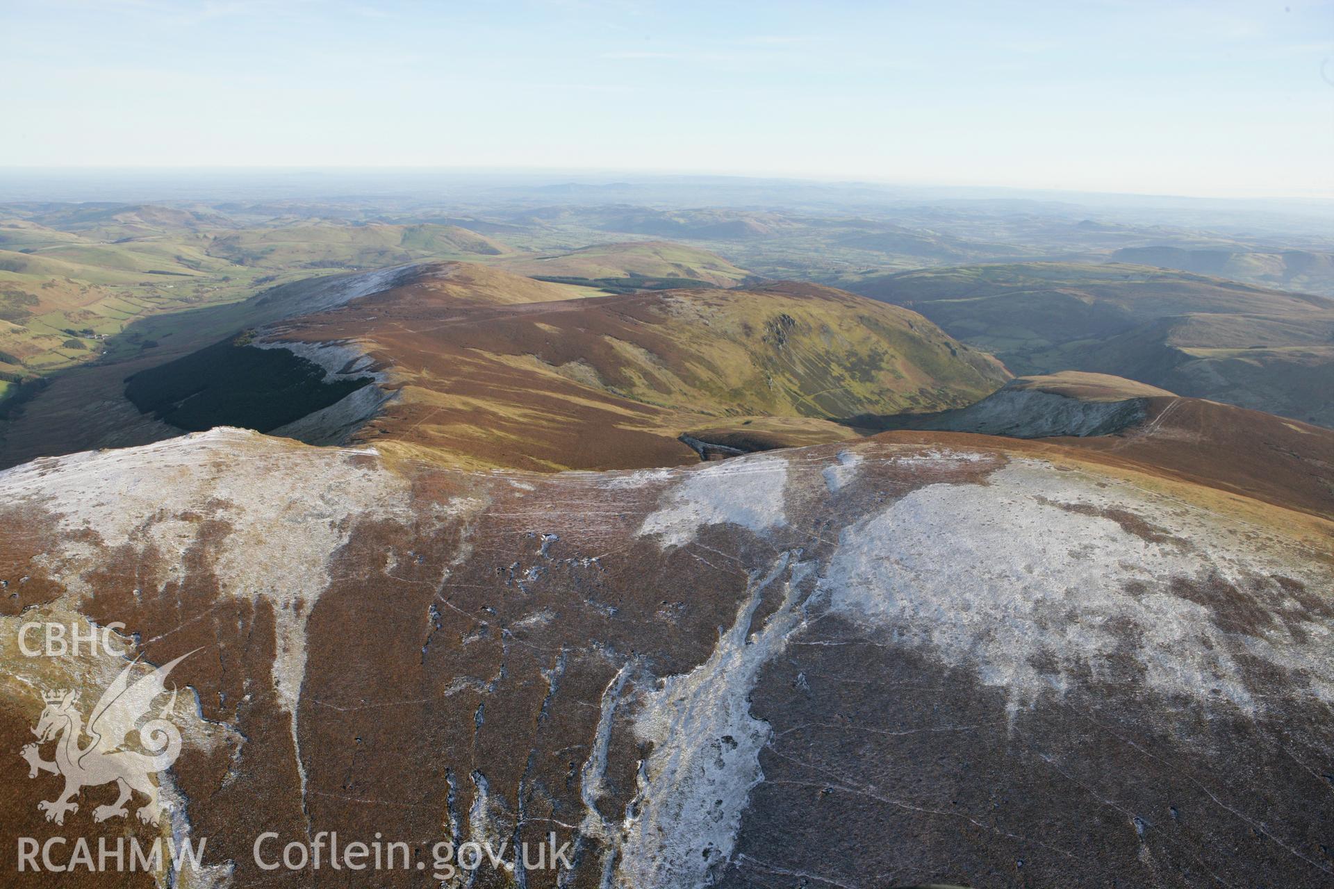 RCAHMW colour oblique photograph of Moel Sych and Moel yr Ewig summits, from the south-west. Taken by Toby Driver on 08/02/2011.