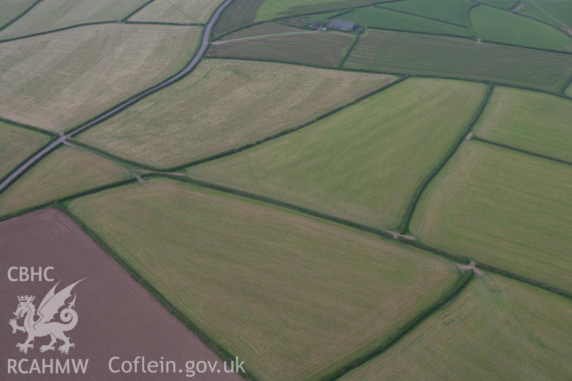 RCAHMW colour oblique photograph of Pen-yr-Heol round barrow. Taken by Toby Driver and Oliver Davies on 04/05/2011.