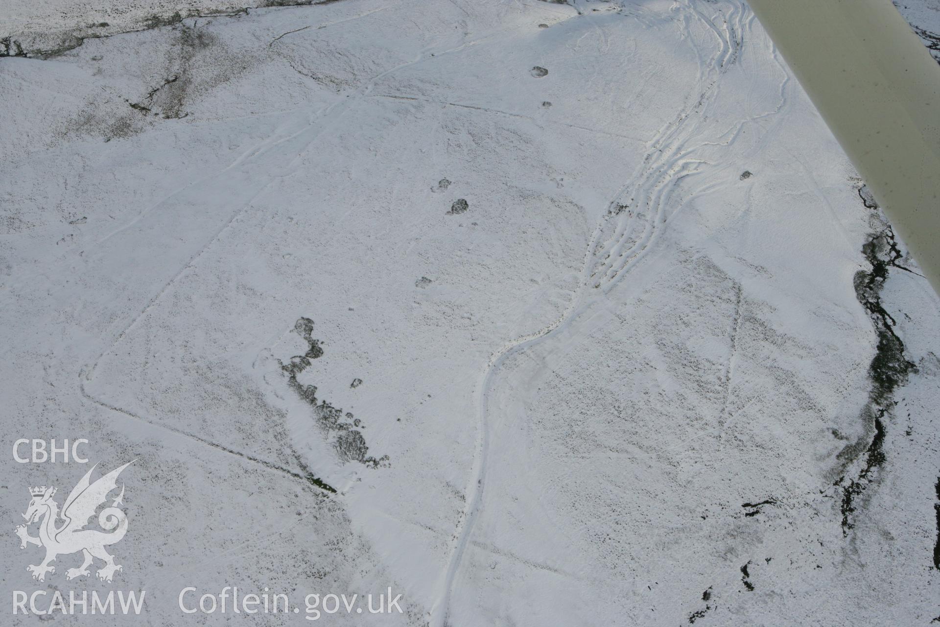 RCAHMW colour oblique photograph of Esgair Perfedd Roman marching camp. Taken by Toby Driver on 18/12/2011.