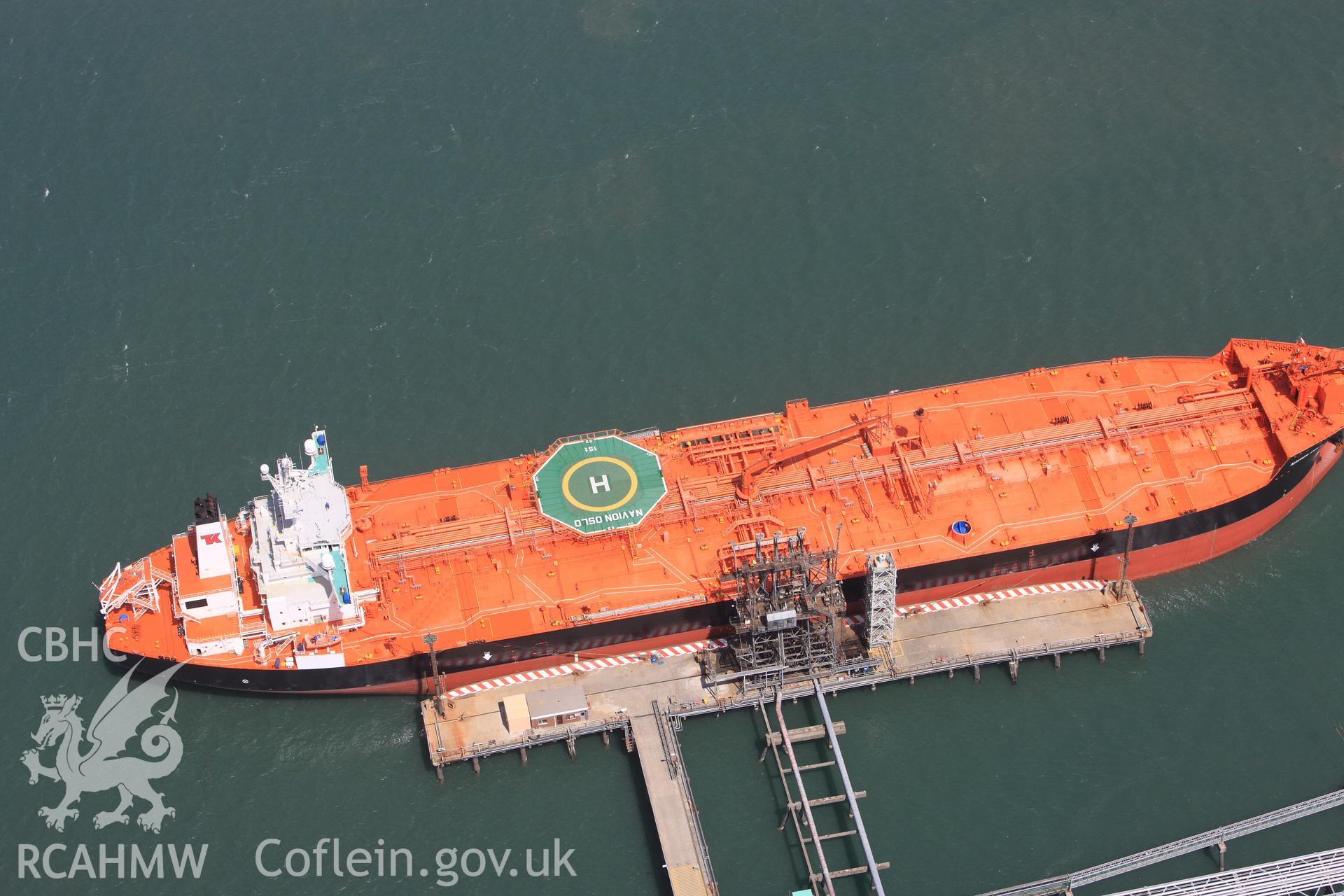 RCAHMW colour oblique photograph of Ships moored along Bullwell Bay Jetty. Taken by Toby Driver on 24/05/2011.