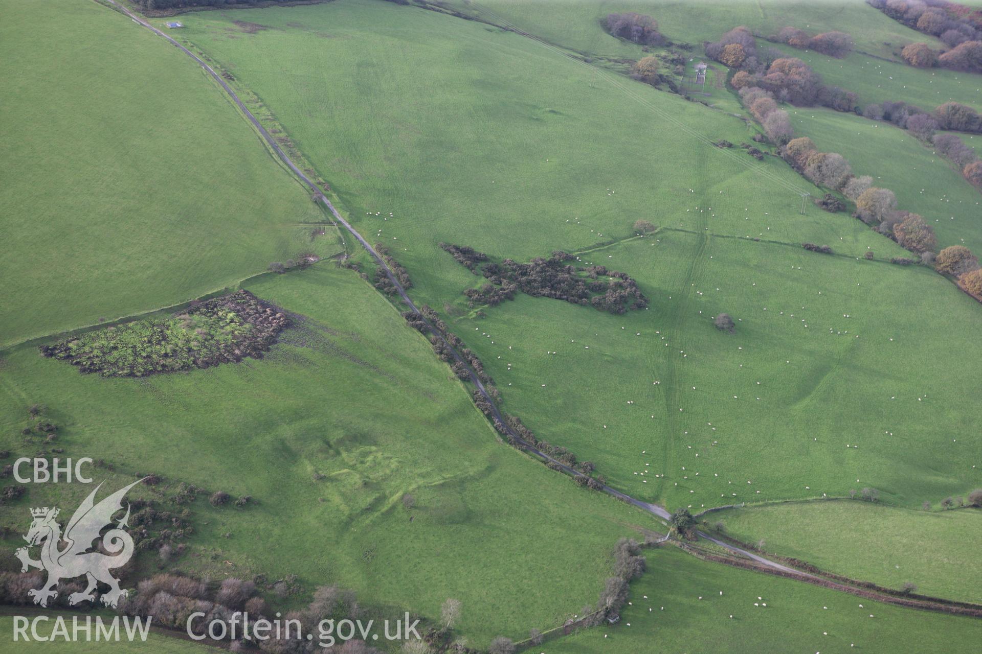 RCAHMW colour oblique photograph of British Fortified Residence, Maescadlawr. Taken by Toby Driver on 17/11/2011.