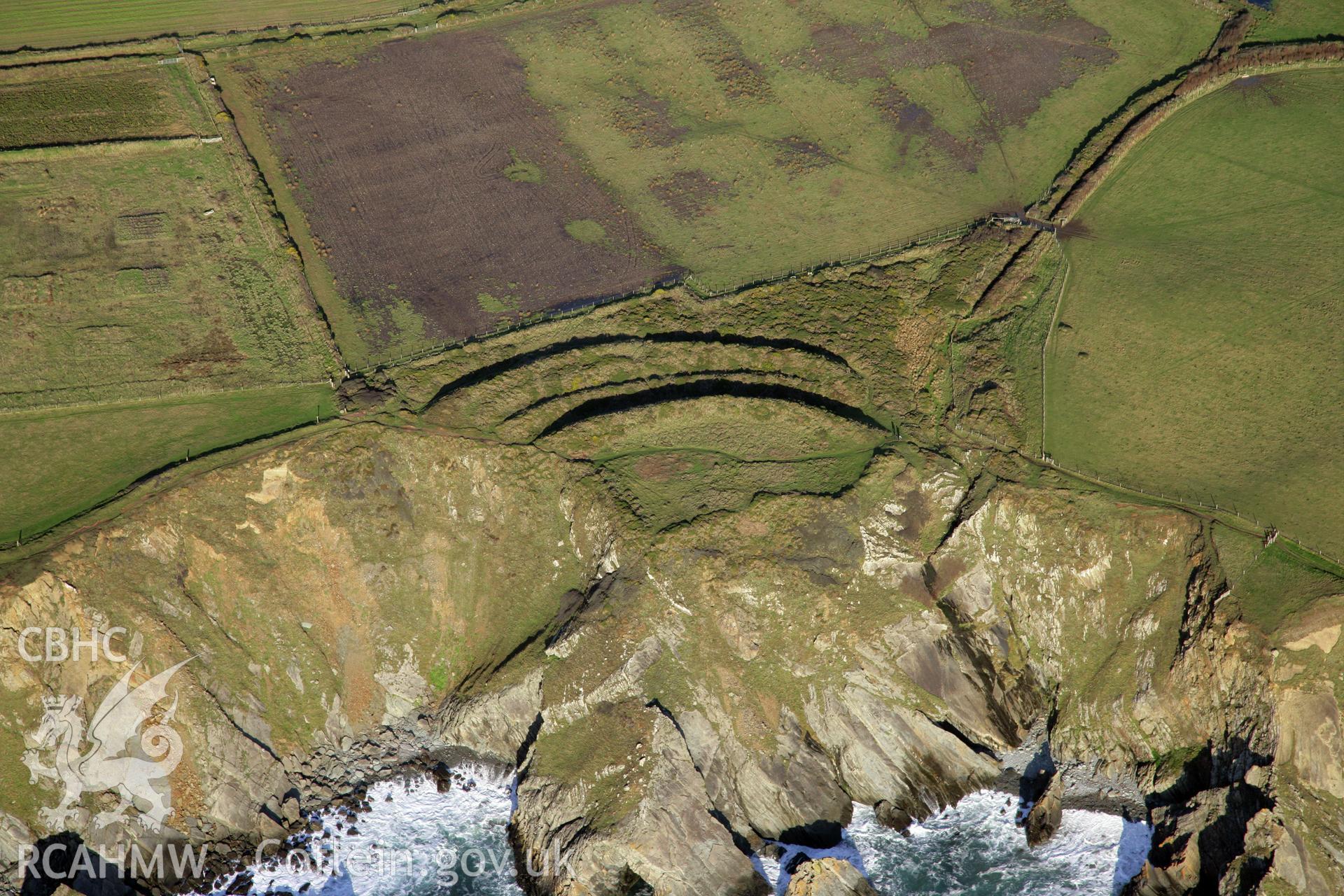 RCAHMW colour oblique photograph of Marloes Sound Rath promontory fort, viewed from the south. Taken by O. Davies & T. Driver on 22/11/2013.