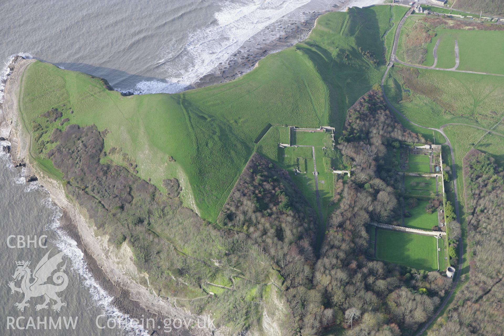 RCAHMW colour oblique photograph of Dunraven Hillfort, with Dunraven Castle, St Brides Major. Taken by Toby Driver on 17/11/2011.