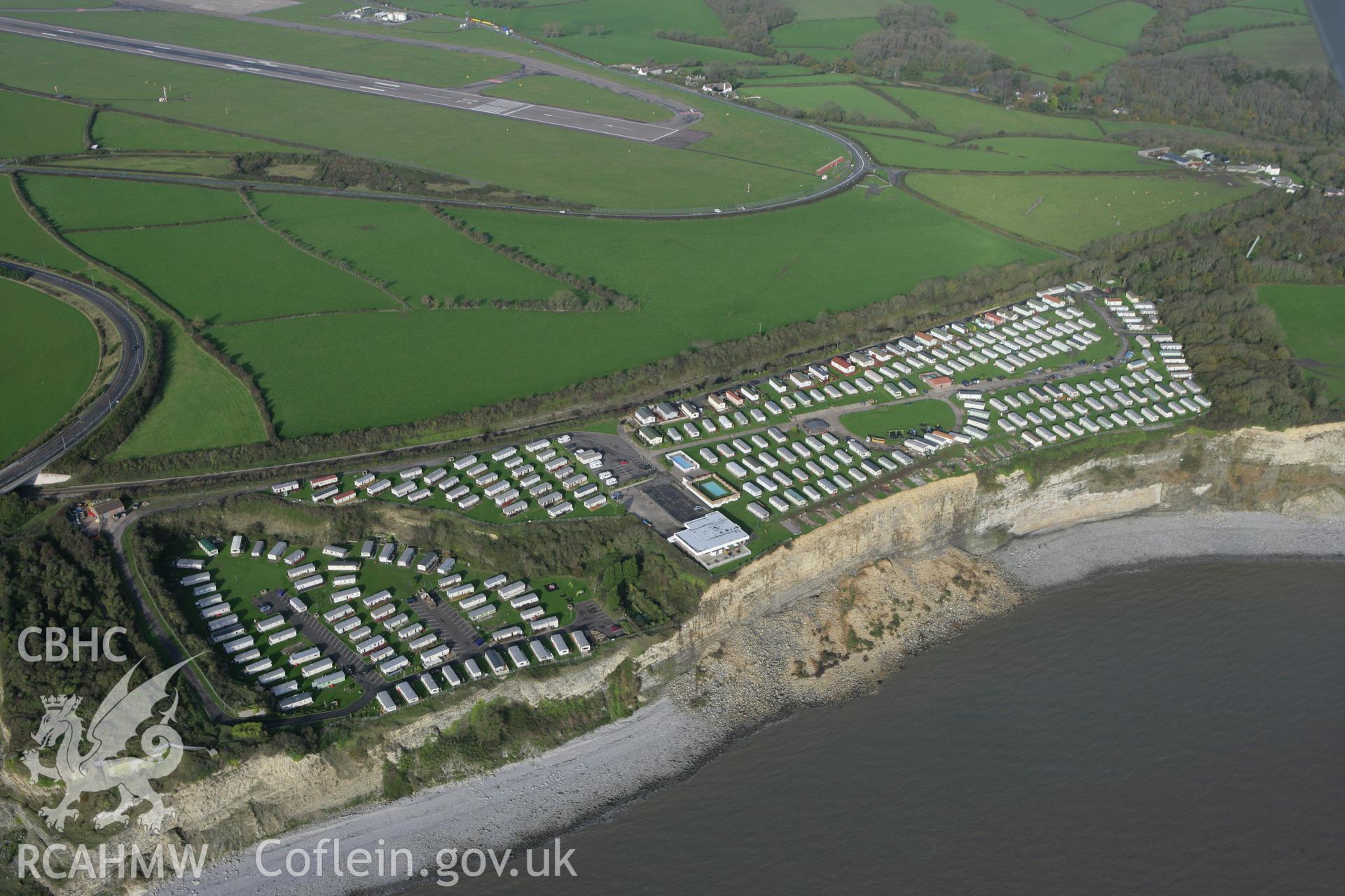 RCAHMW colour oblique photograph of Porthkerry Caravan Site, with landslip. Taken by Toby Driver on 17/11/2011.