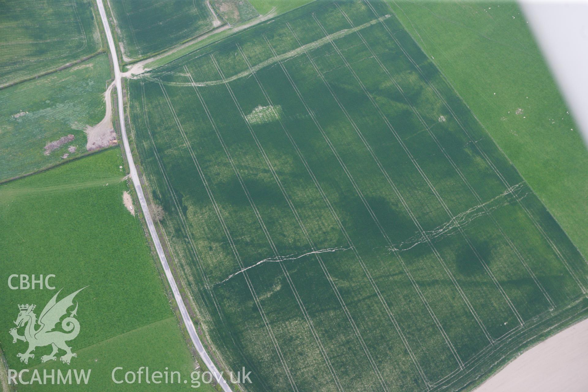 RCAHMW colour oblique photograph of Hindwell Cursus, north-east terminal. Taken by Toby Driver on 26/04/2011.