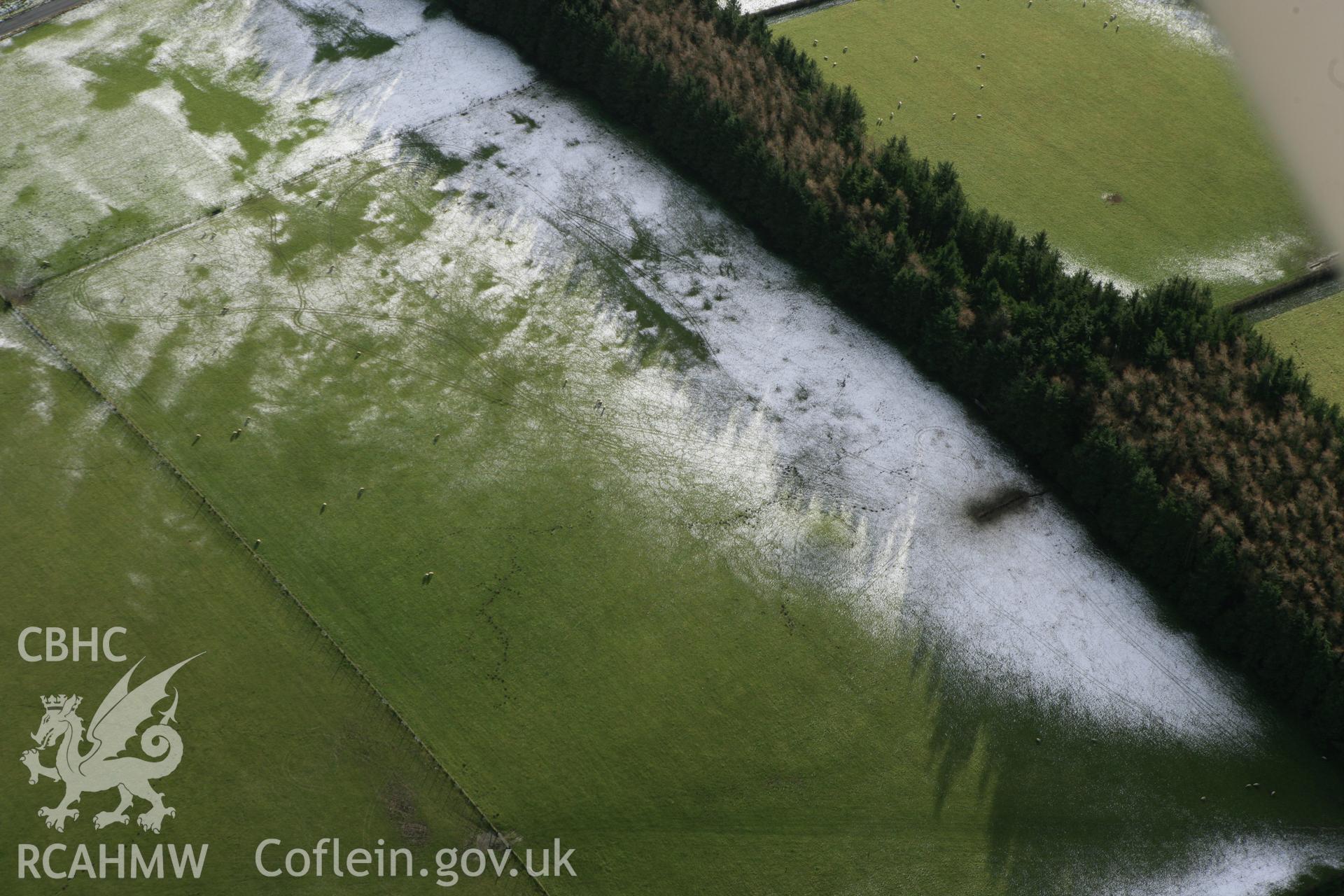 RCAHMW colour oblique photograph of Cynych/Crugyn Round Barrow. Taken by Toby Driver on 18/12/2011.