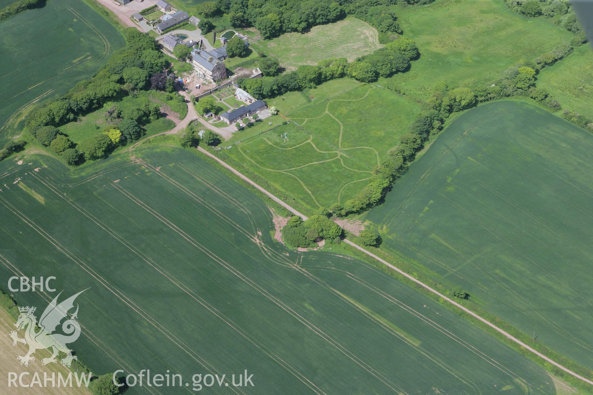 RCAHMW colour oblique photograph of Cropmarks east of Butterhill Farm. Taken by Toby Driver on 24/05/2011.