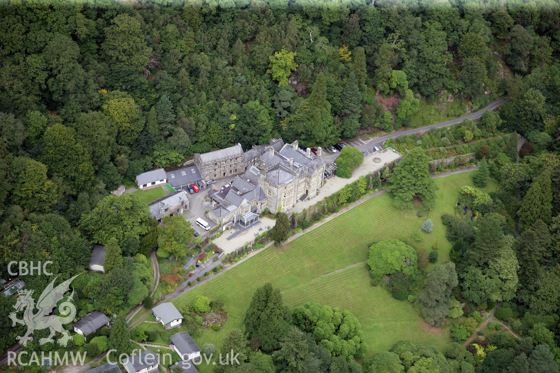 RCAHMW colour oblique photograph of Plas Tan-y-bwlch, house and gardens. Taken by Toby Driver on 17/08/2011.