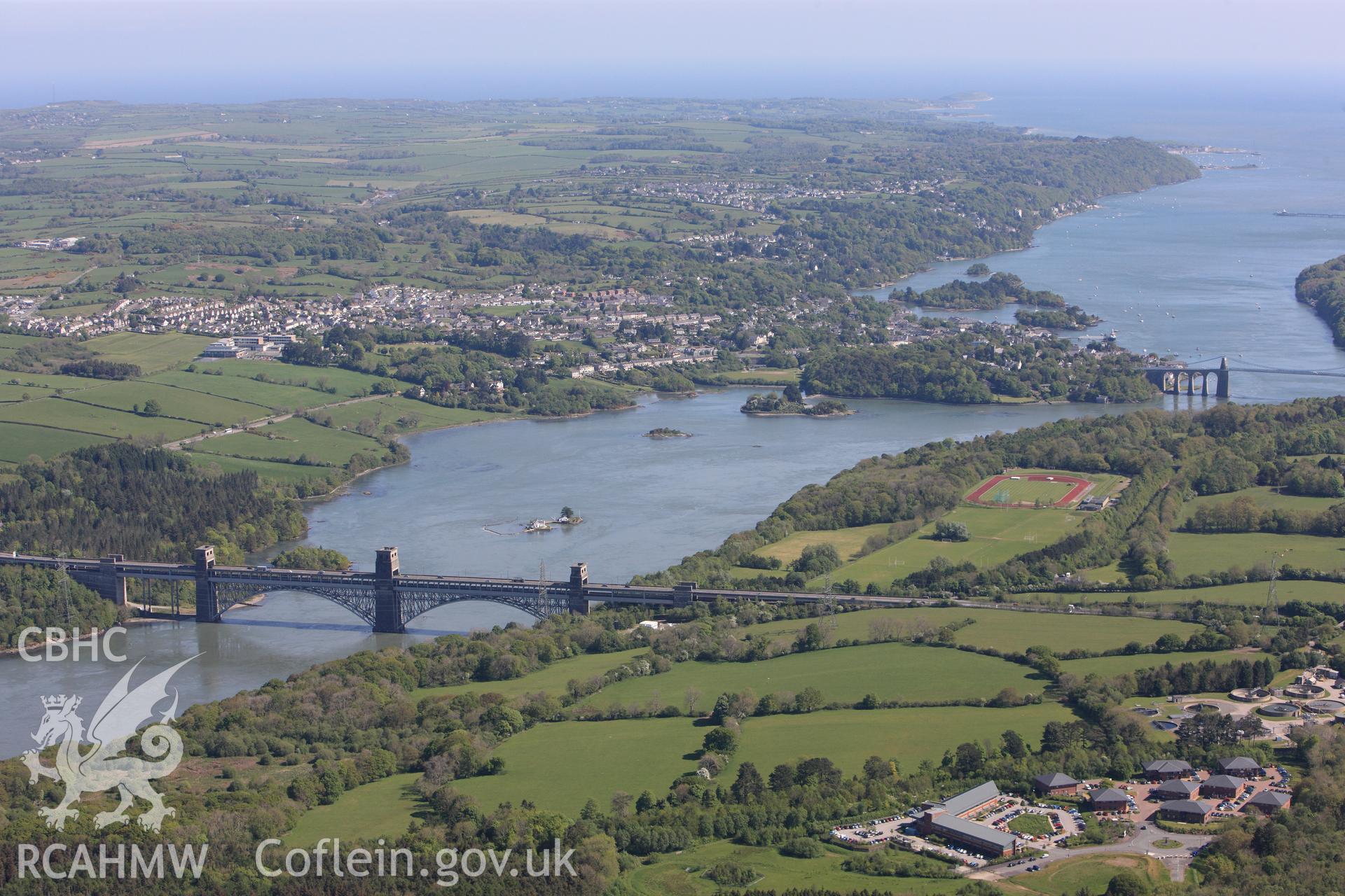 RCAHMW colour oblique photograph of Pont Britannica and the Menai Suspension Bridge, Menai Straits. Taken by Toby Driver on 03/05/2011.