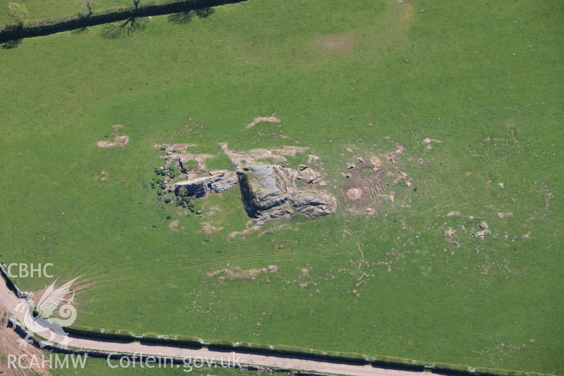 RCAHMW colour oblique photograph of cup-marked rock to the west of Bryn Celli Ddu. Taken by Toby Driver on 03/05/2011.