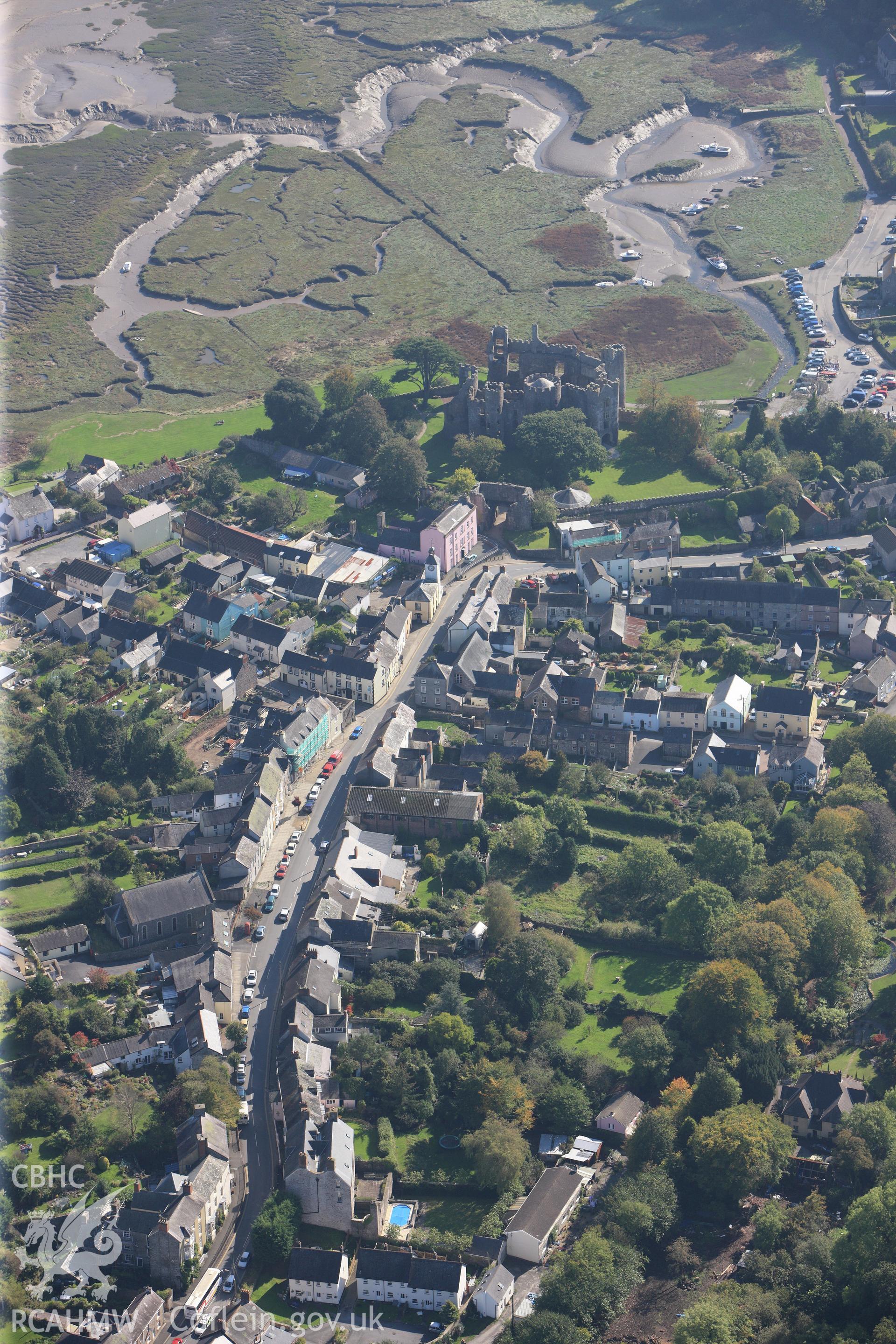 RCAHMW colour oblique photograph of Laugharne, viewed from the north, looking seaward towards the castle. Taken by Toby Driver and Oliver Davies on 28/09/2011.