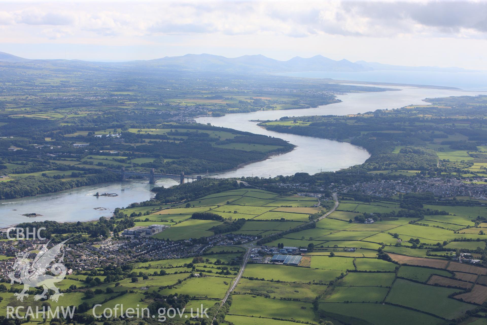 RCAHMW colour oblique photograph of Pont Britannia and Menai Strait, landscape from north-east. Taken by Toby Driver on 20/07/2011.