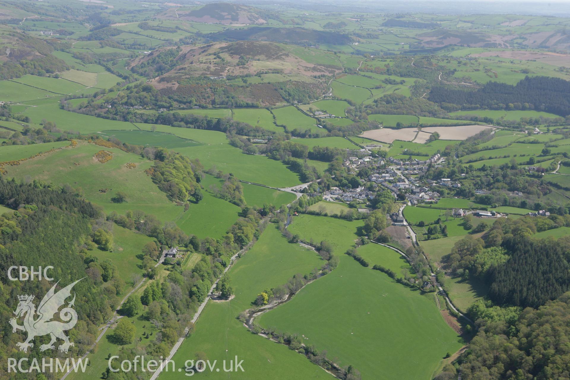 RCAHMW colour oblique photograph of Llanfair Talhaiarn, from the west. Taken by Toby Driver on 03/05/2011.